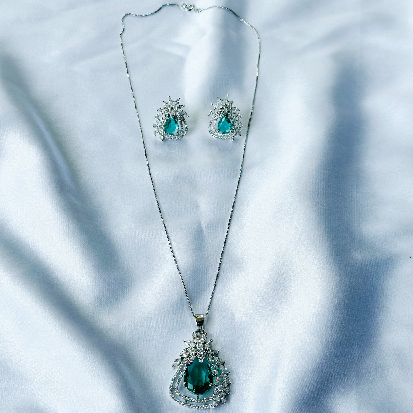 Sea Green Topaz Cubic Zircon American Diamond Silver Plated Pendant Set