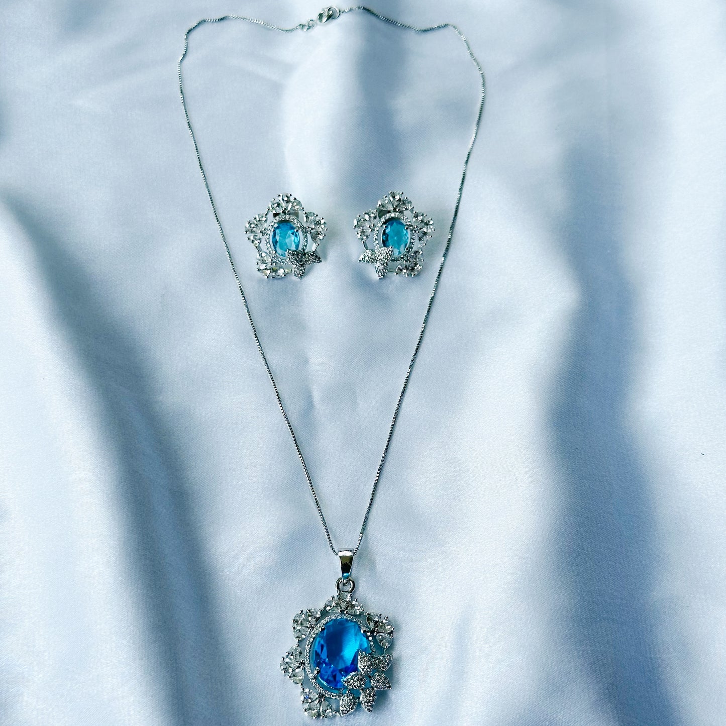 Aqua Blue Sapphire Cubic Zircon American Diamond Silver Plated Pendant Set
