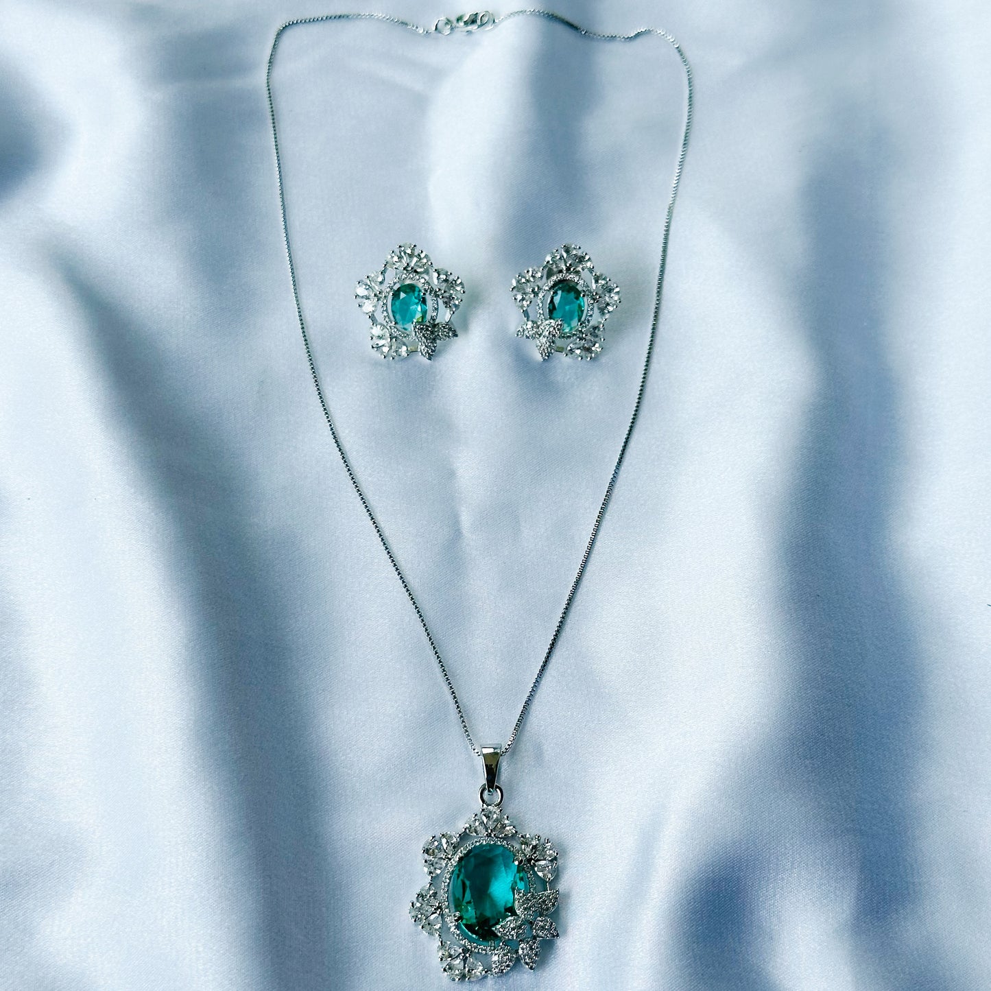 Sea Green Topaz Cubic Zircon American Diamond Silver Plated Pendant Set