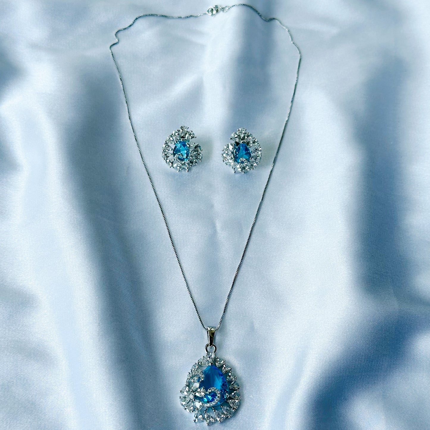 Aqua Blue Sapphire Cubic Zircon American Diamond Silver Plated Pendant Set