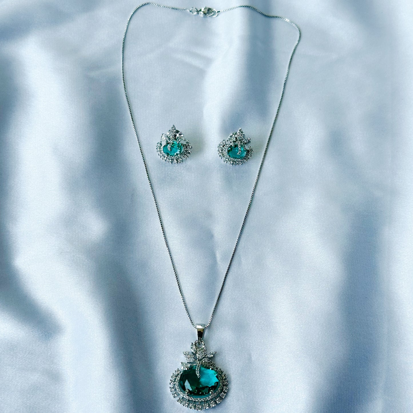 Sea Green Topaz Cubic Zircon American Diamond Silver Plated Pendant Set