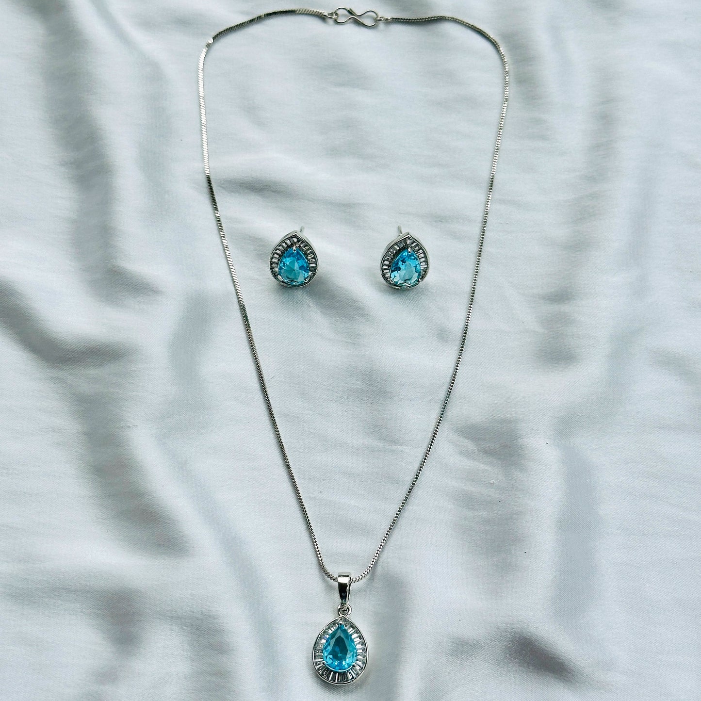 Aqua Blue Sapphire Cubic Zircon American Diamond Silver Plated Pendant Set