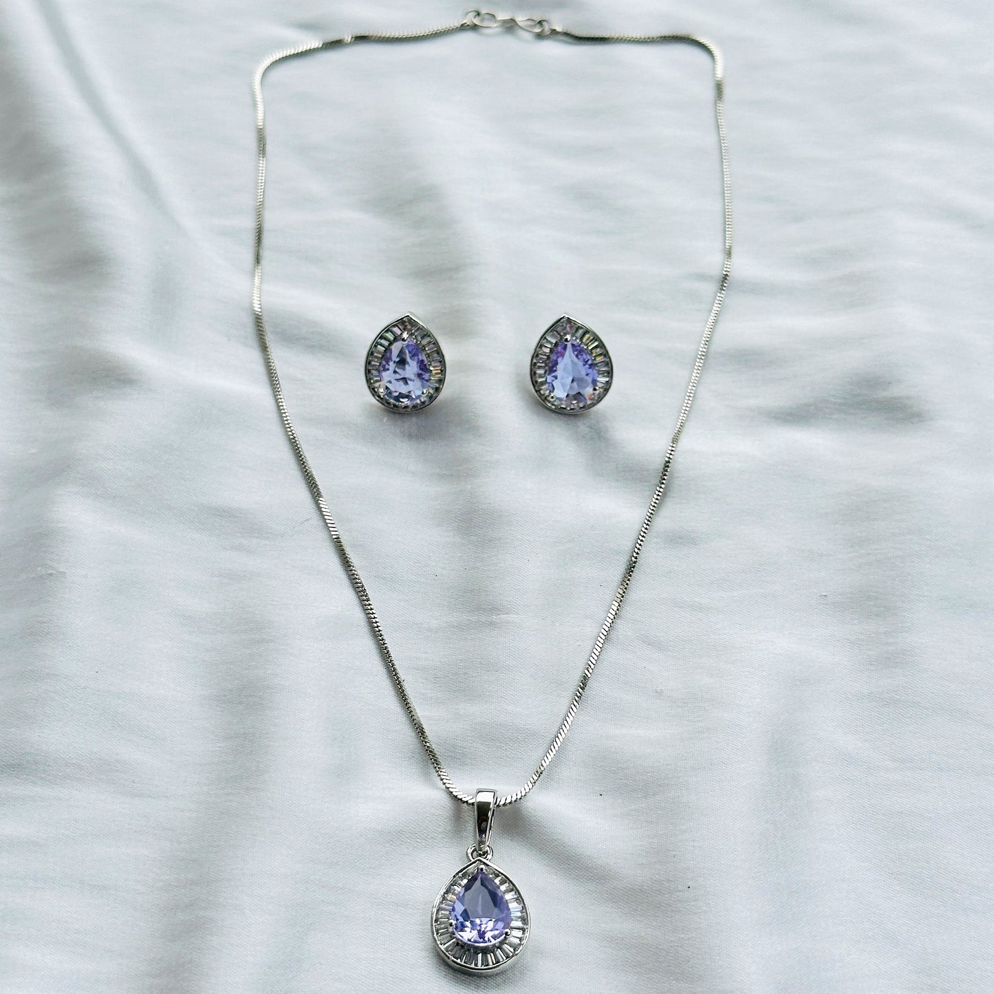 Light Amethyst Cubic Zircon American Diamond Silver Plated Pendant Set