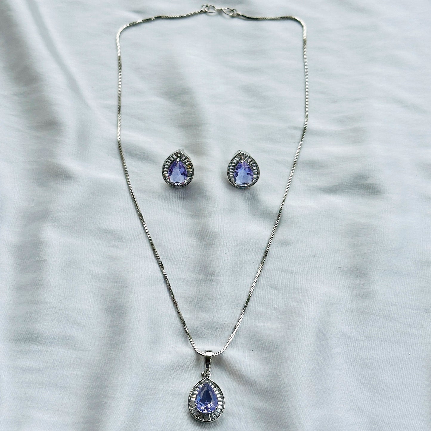 Light Amethyst Cubic Zircon American Diamond Silver Plated Pendant Set