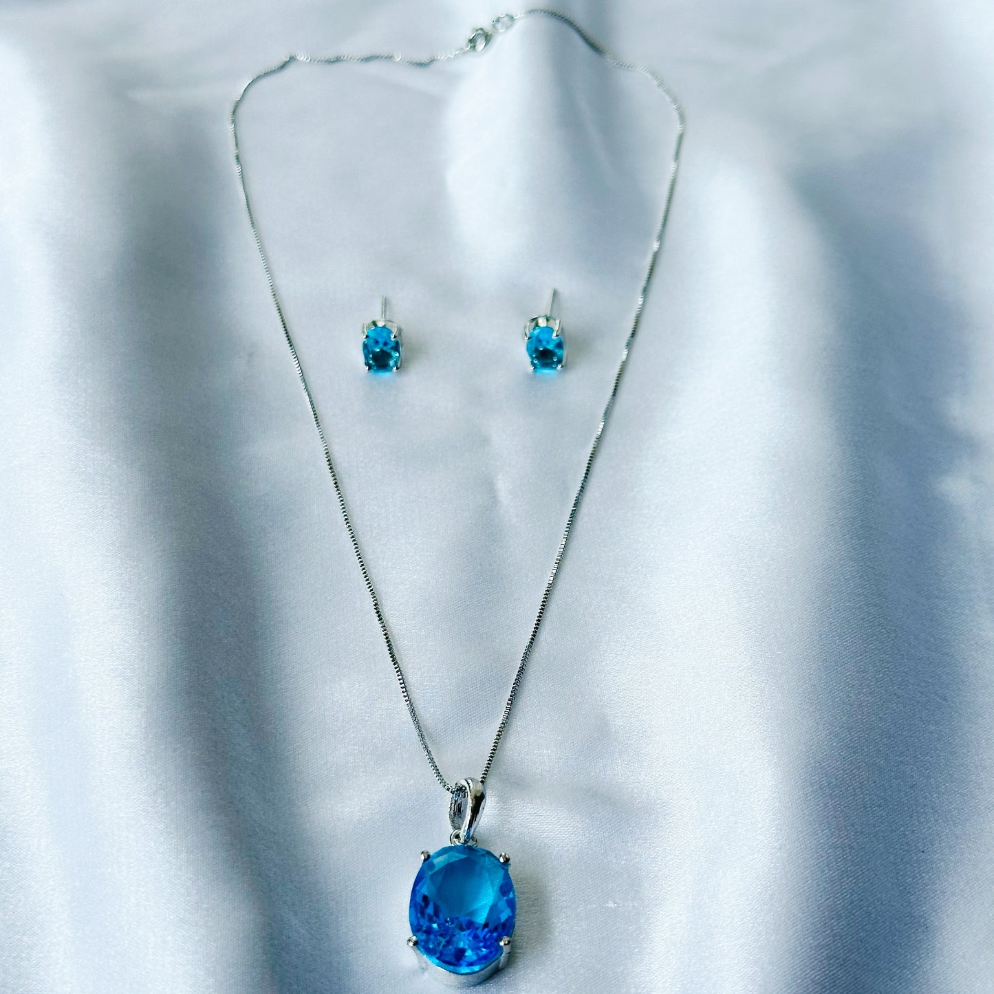 Aqua Blue Sapphire Cubic Zircon American Diamond Silver Plated Pendant Set