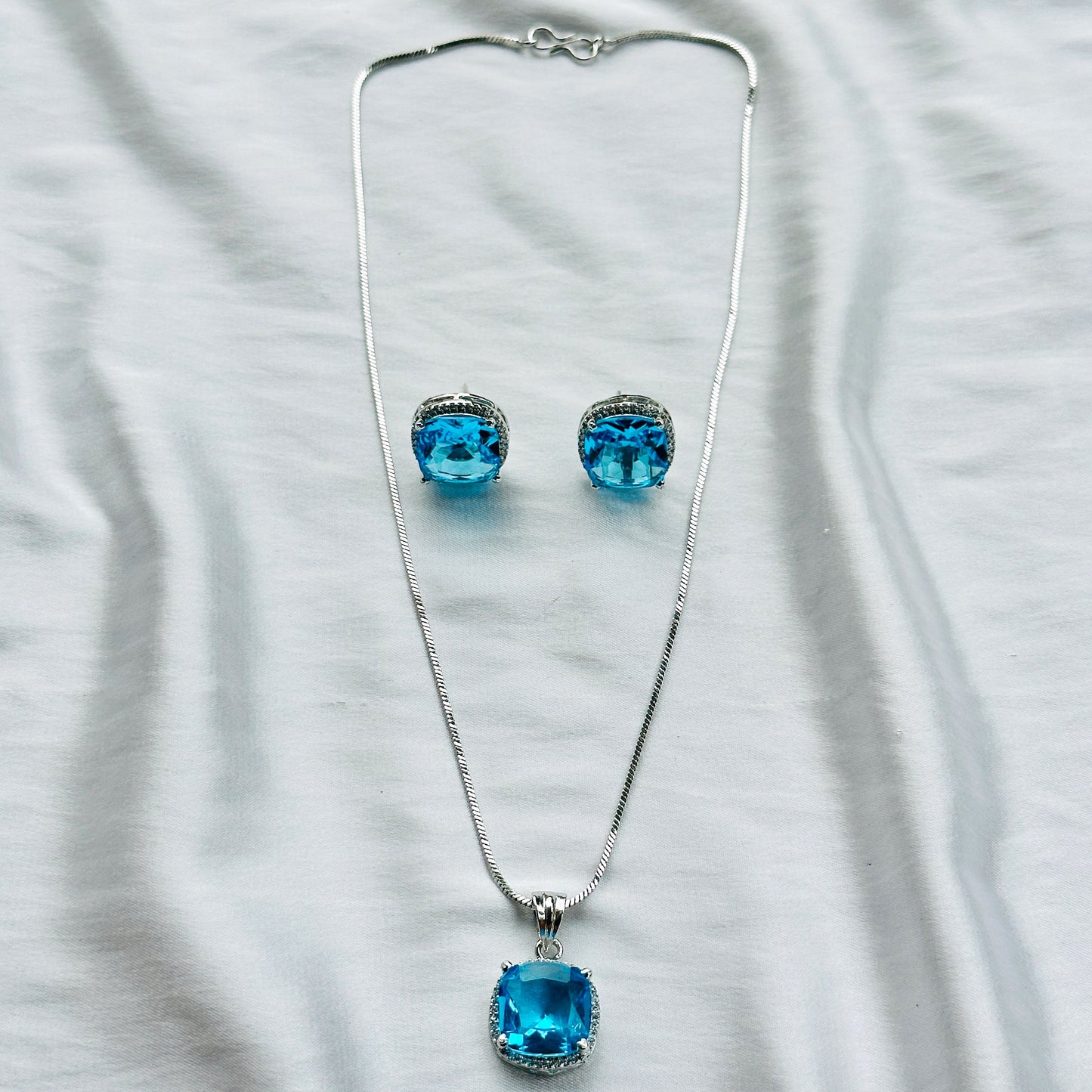 Aqua Blue Sapphire Cubic Zircon American Diamond Silver Plated Pendant Set