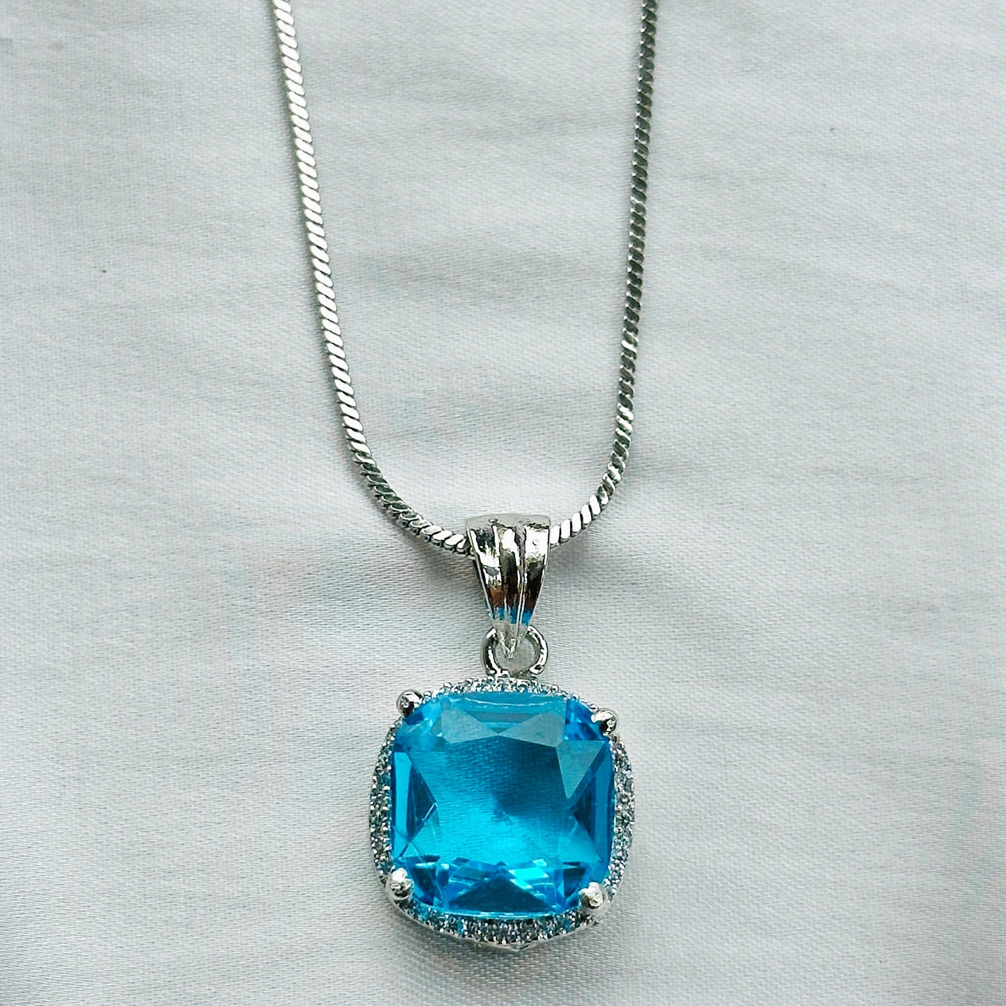 Aqua Blue Sapphire Cubic Zircon American Diamond Silver Plated Pendant Set