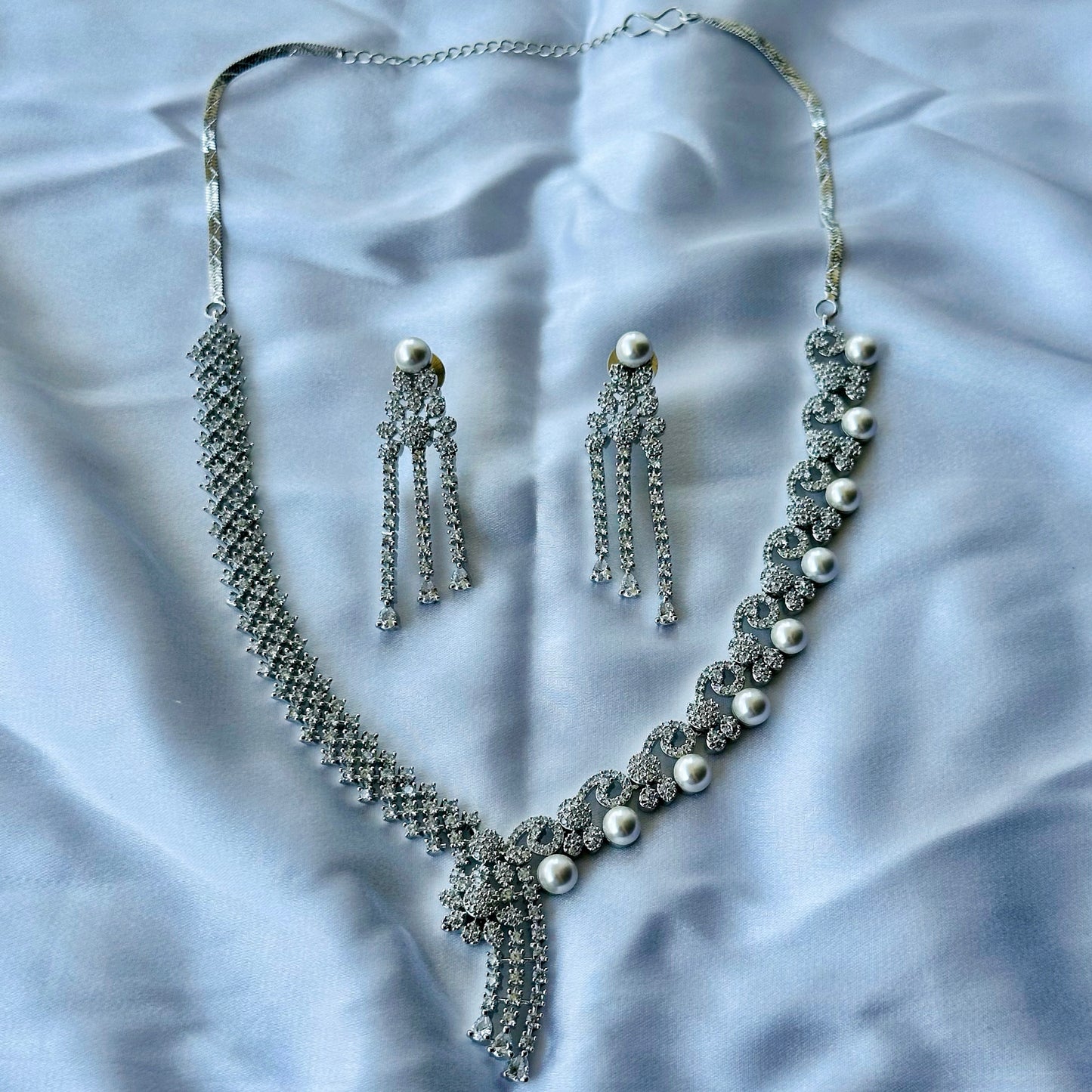 Solitaire Cubic Zircon American Diamond Pearl Studded Silver Plated Necklace Set