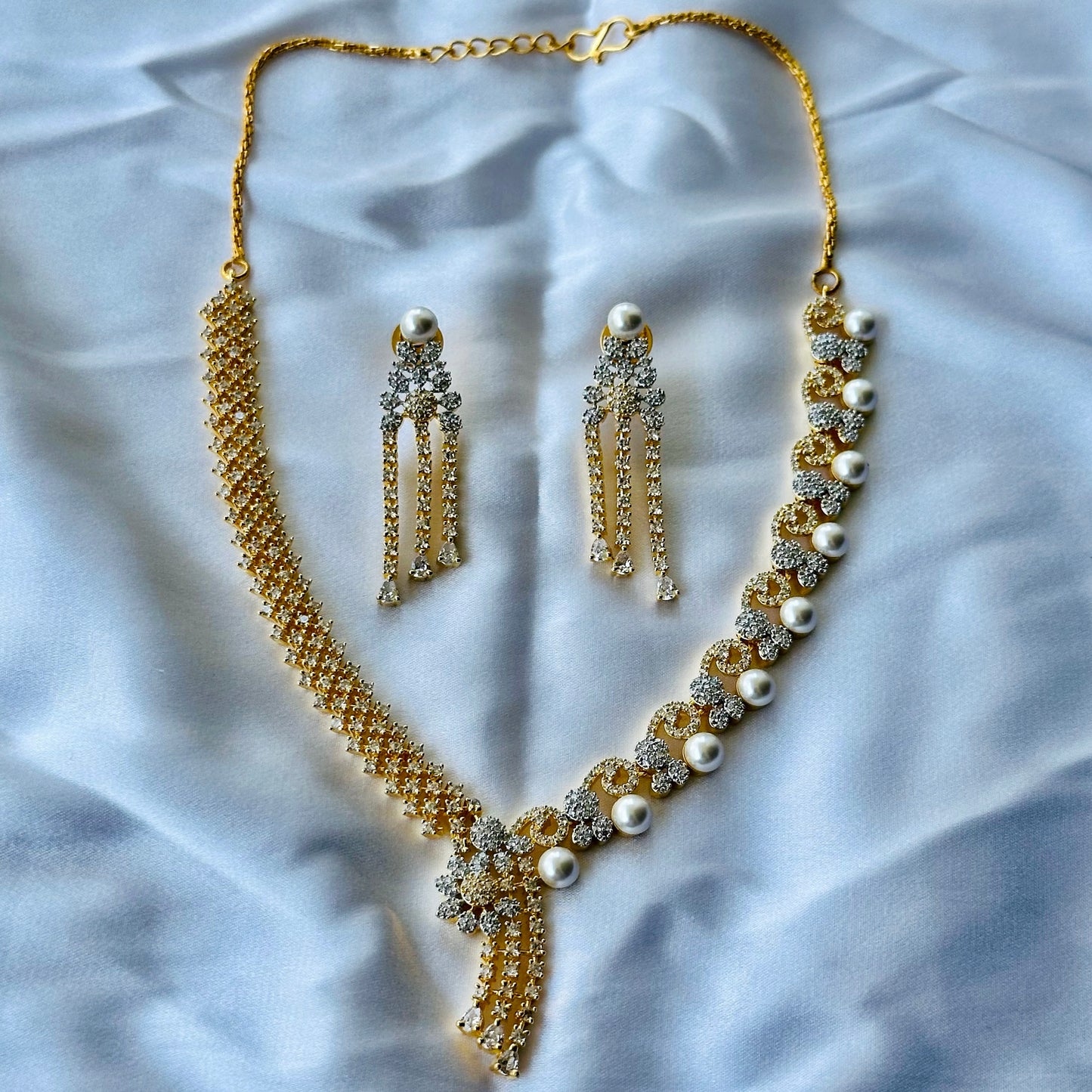 Solitaire Cubic Zircon American Diamond Pearl Studded Gold Plated Necklace Set