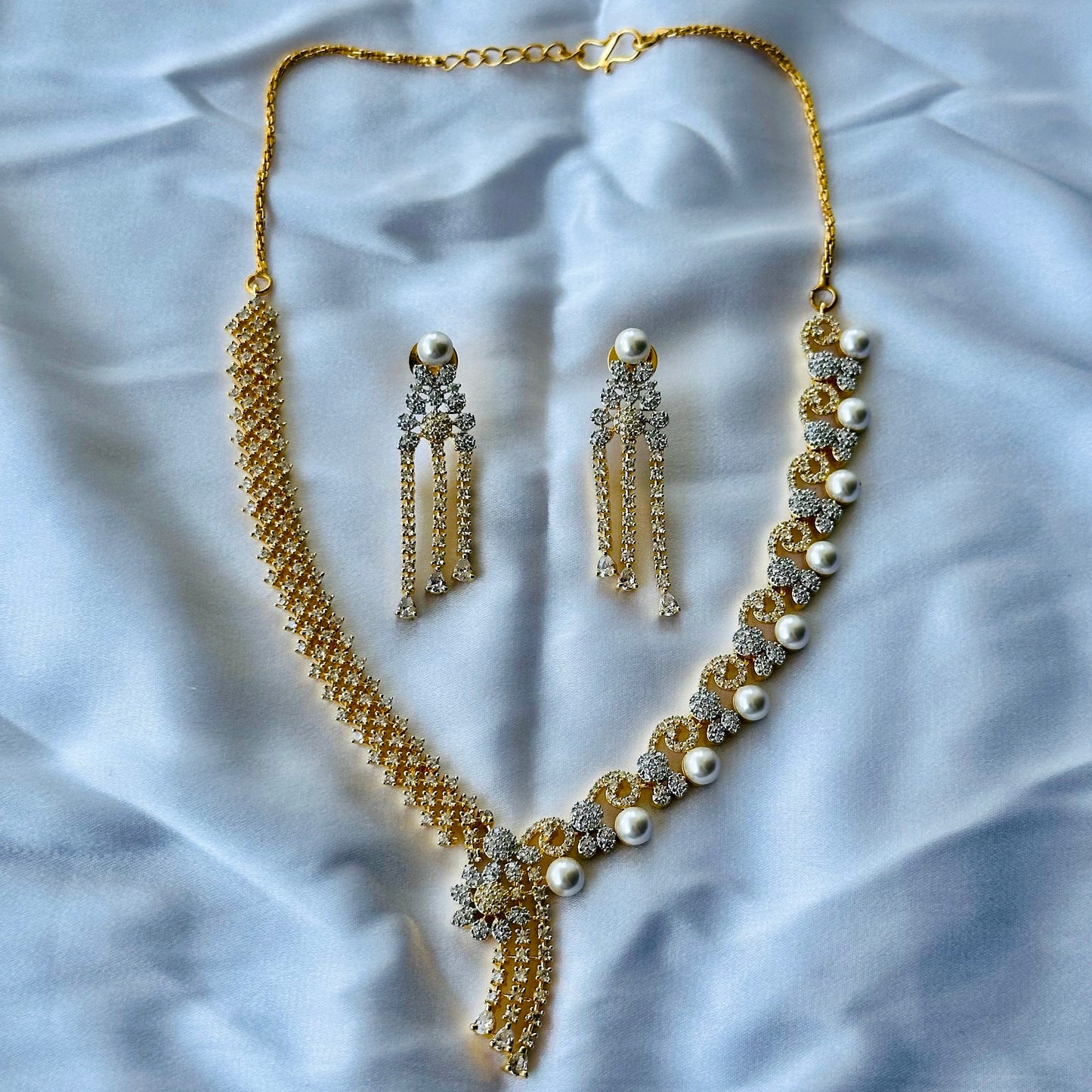 Solitaire Cubic Zircon American Diamond Pearl Studded Gold Plated Necklace Set