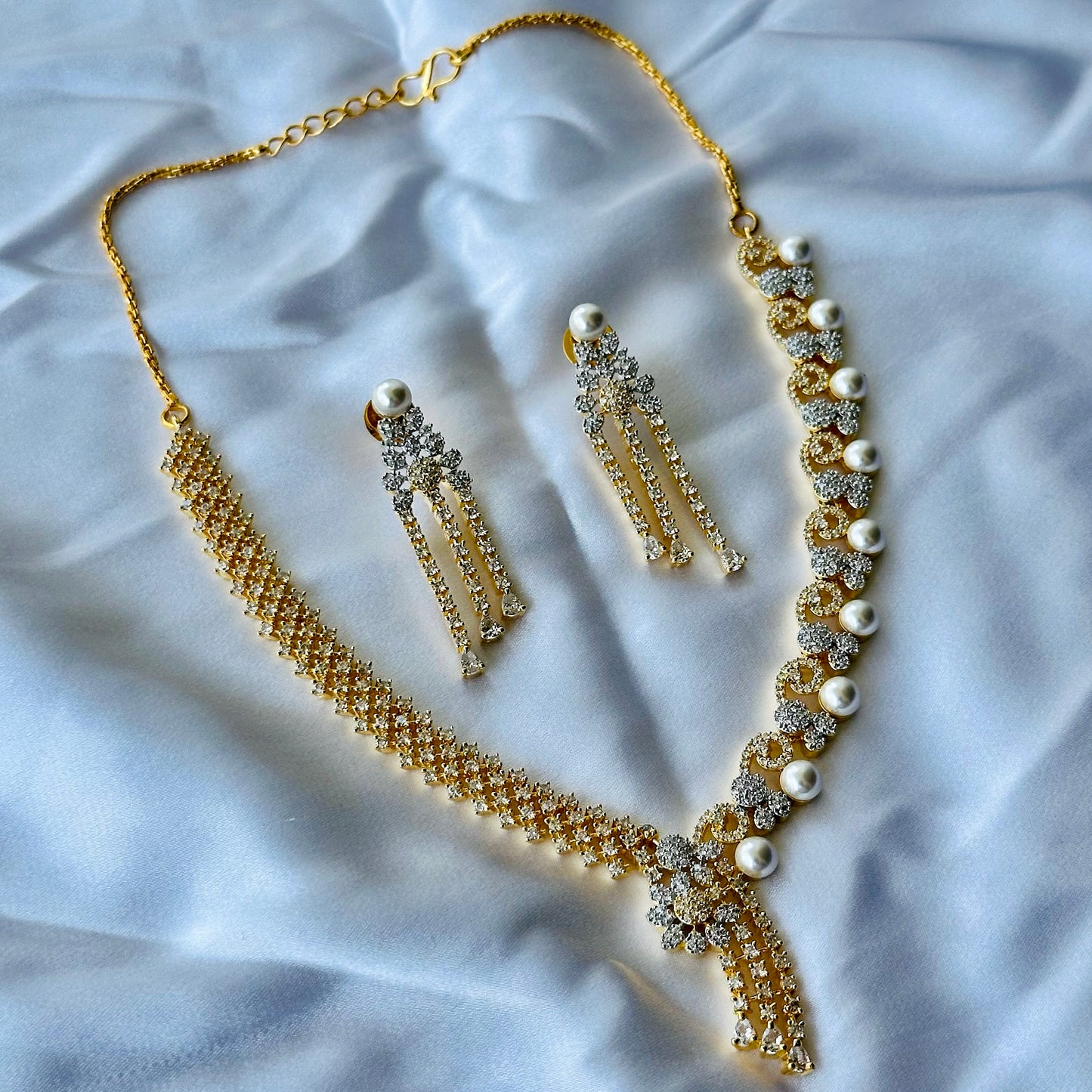 Solitaire Cubic Zircon American Diamond Pearl Studded Gold Plated Necklace Set