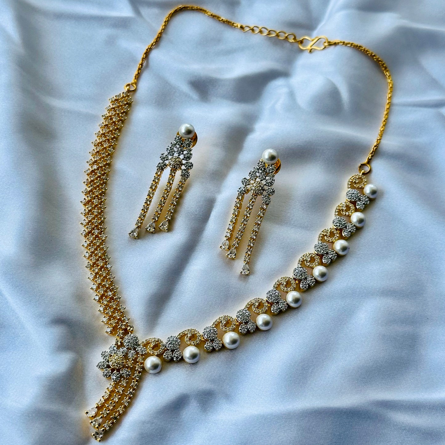 Solitaire Cubic Zircon American Diamond Pearl Studded Gold Plated Necklace Set