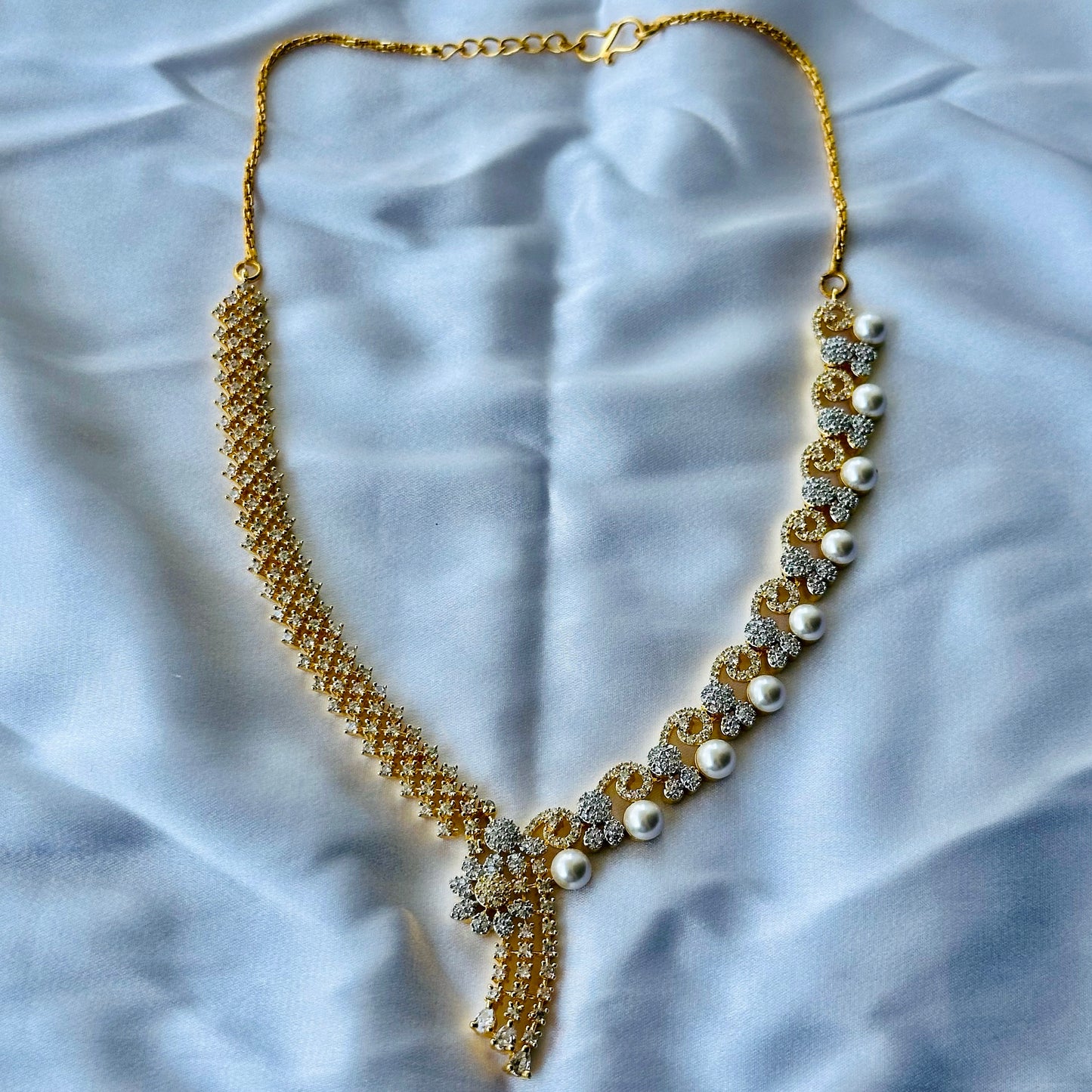 Solitaire Cubic Zircon American Diamond Pearl Studded Gold Plated Necklace Set