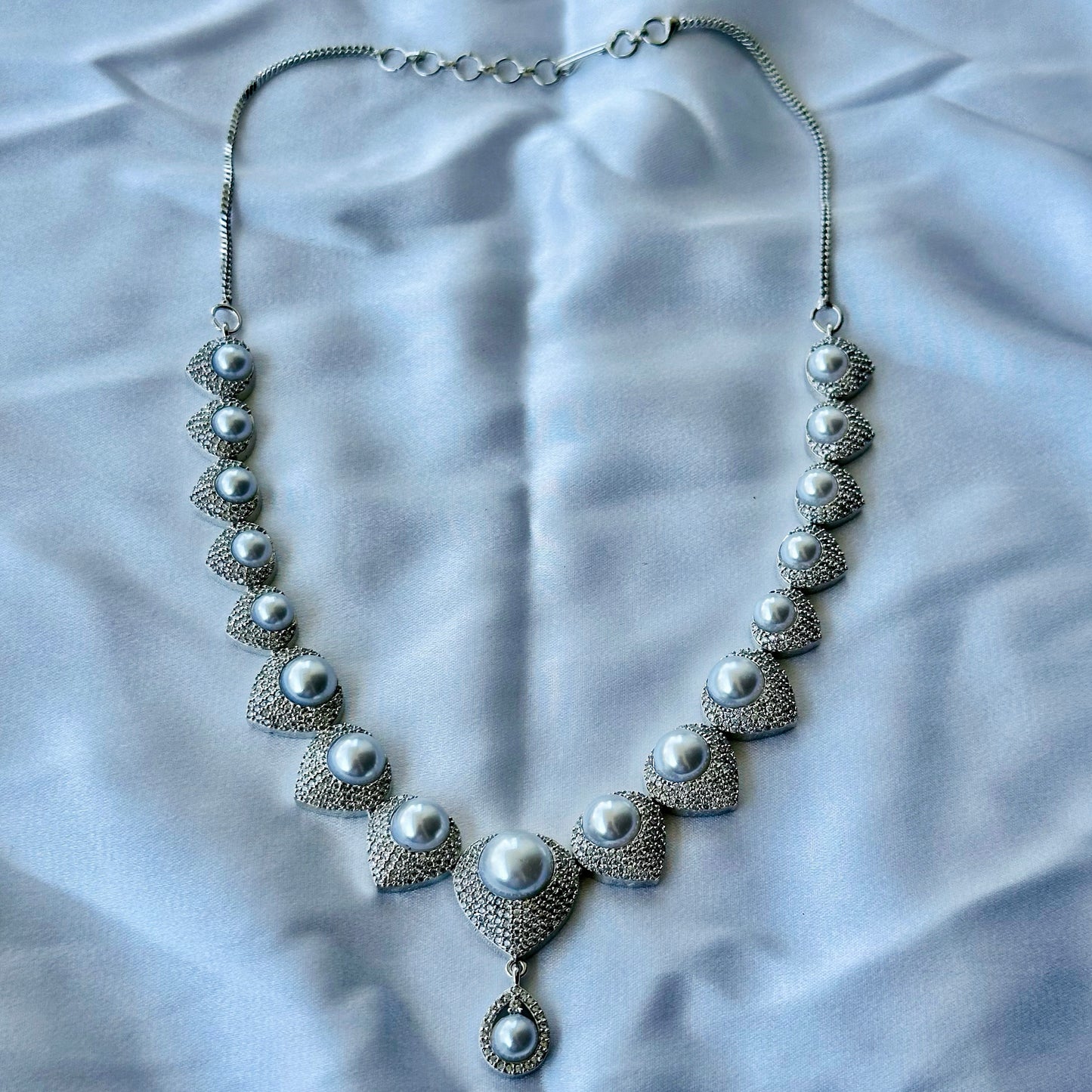 Solitaire Cubic Zircon American Diamond Pearl Studded Silver Plated Necklace Set