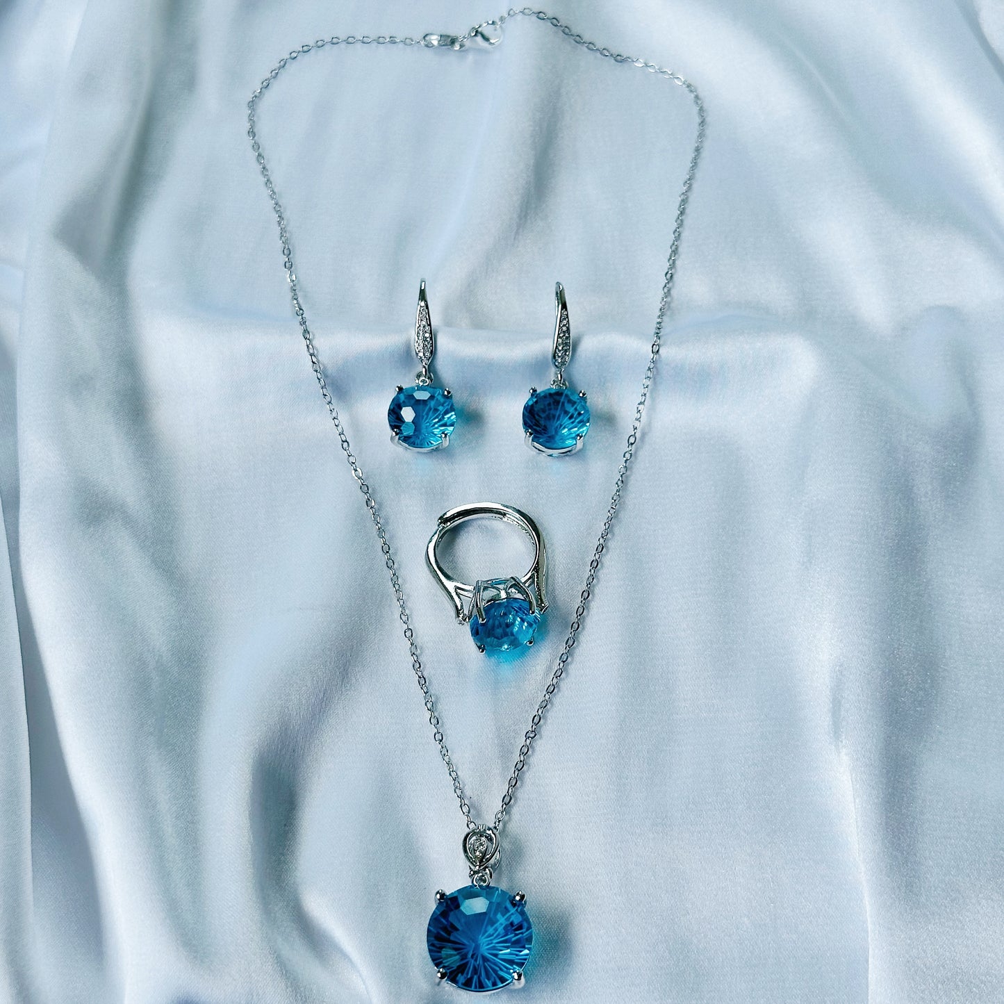 Aqua Blue Sapphire Cubic Zircon Ice Cut American Diamond Silver Plated Pendant Set Combo