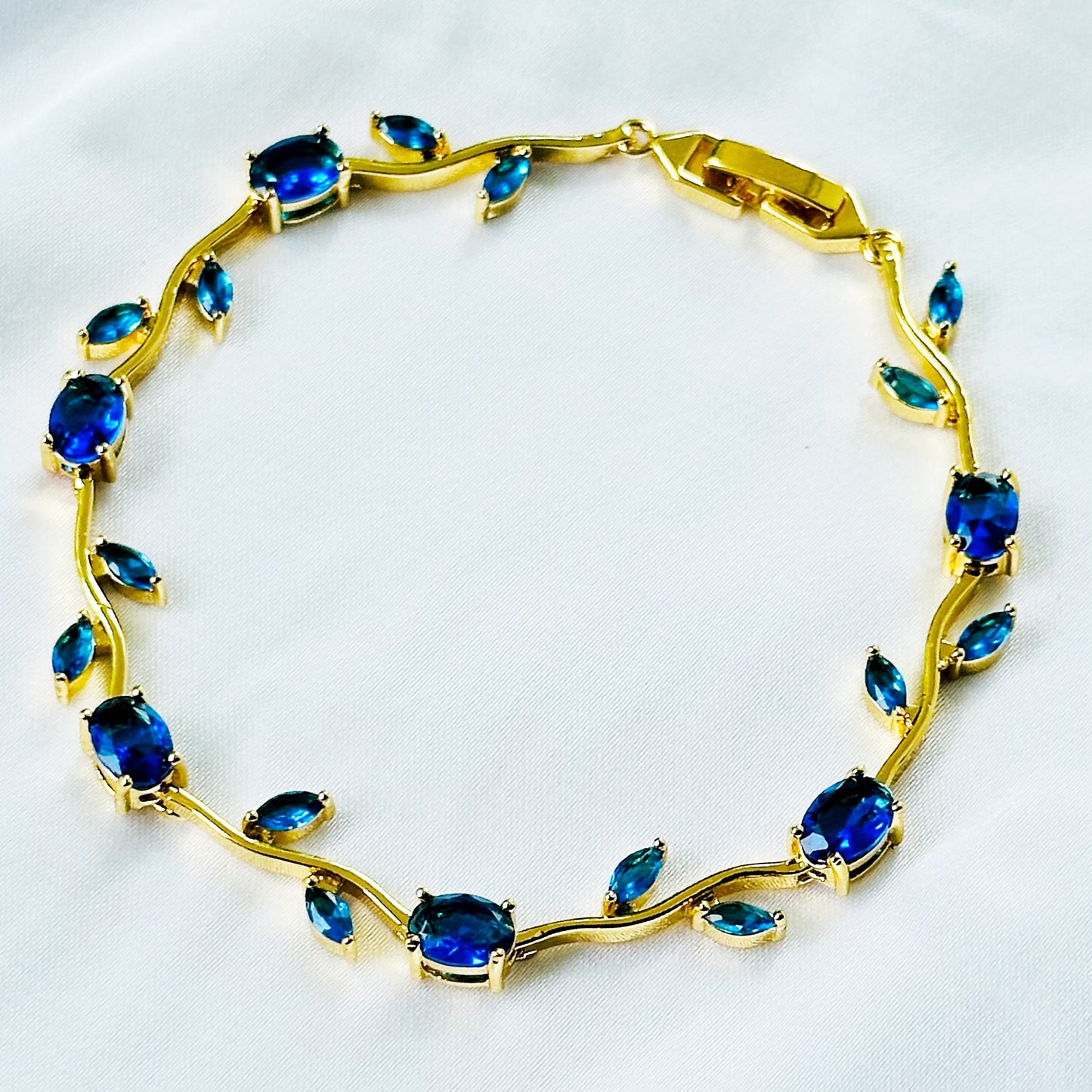Blue Sapphire Cubic Zirconia Tulip Design American Diamond Gold Plated Stainless Steel Bracelet