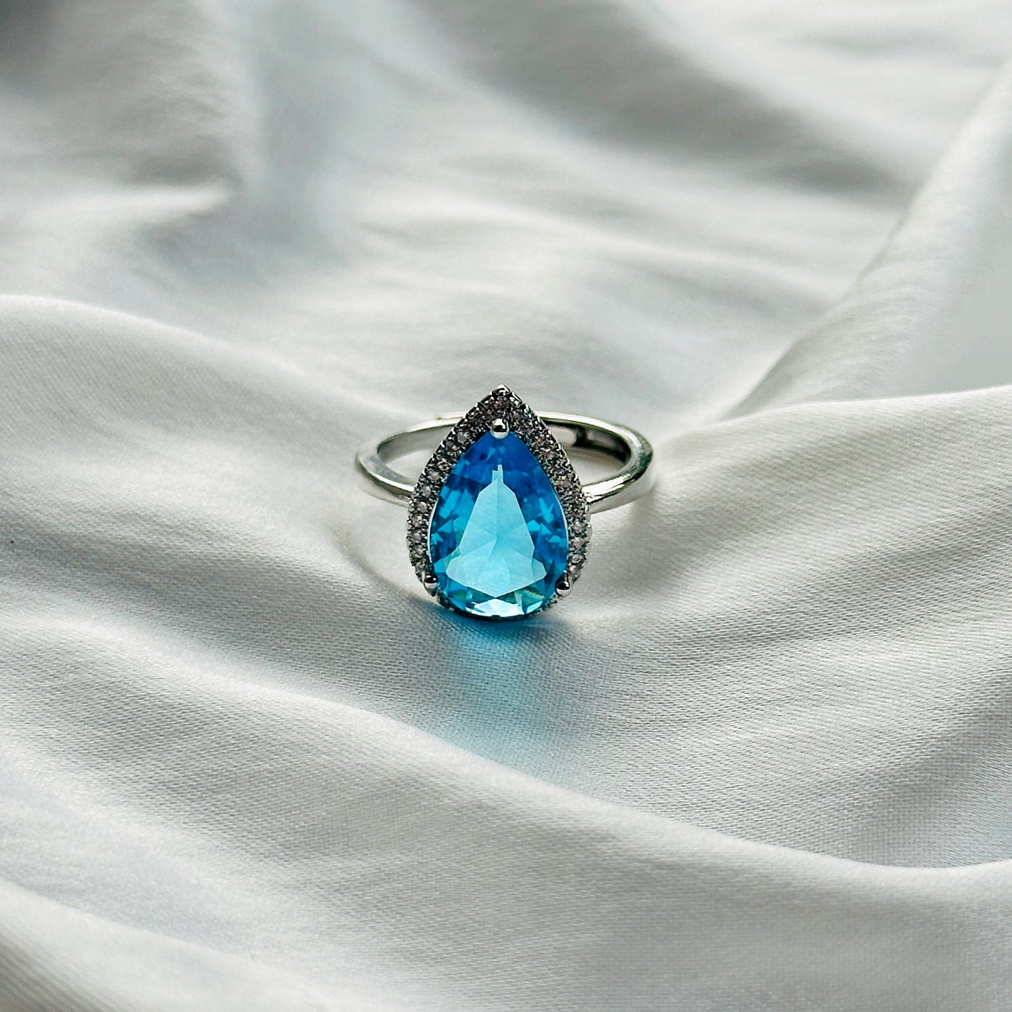 Aqua Blue Sapphire Cubic Zircon Ice Cut Stone American Diamond Silver Plated Adjustable Ring