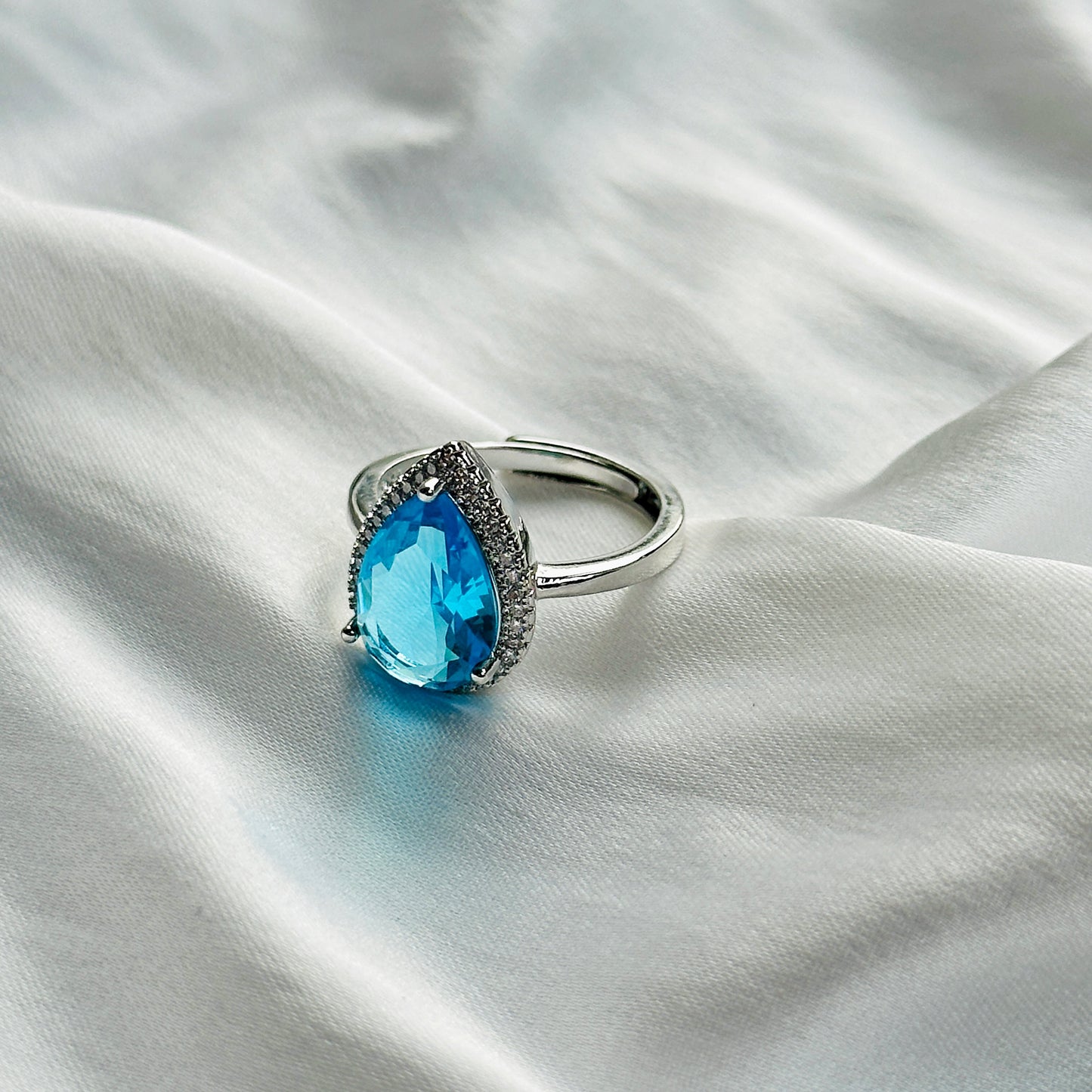 Aqua Blue Sapphire Cubic Zircon Ice Cut Stone American Diamond Silver Plated Adjustable Ring