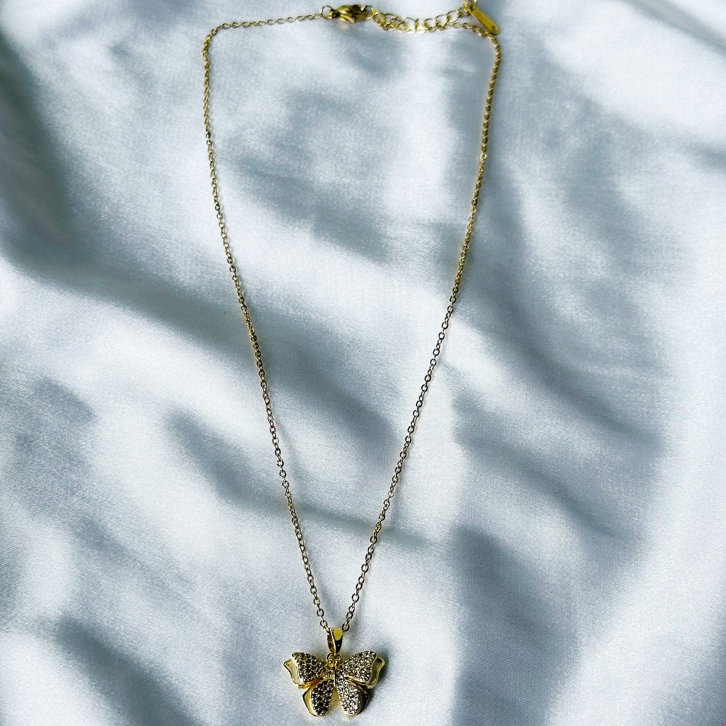 Bow Design American Diamond Gold Plated Stainless Steel Necklace