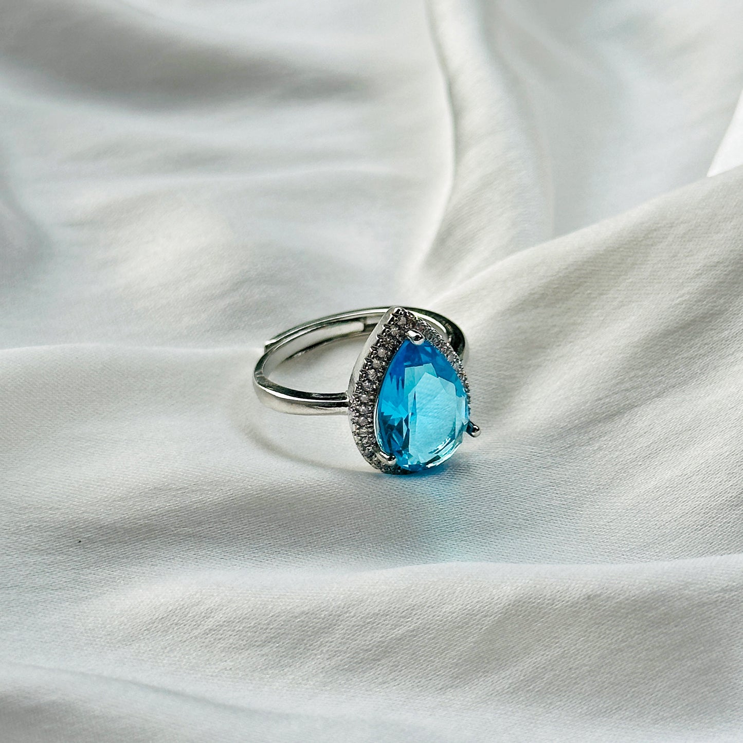 Aqua Blue Sapphire Cubic Zircon Ice Cut Stone American Diamond Silver Plated Adjustable Ring