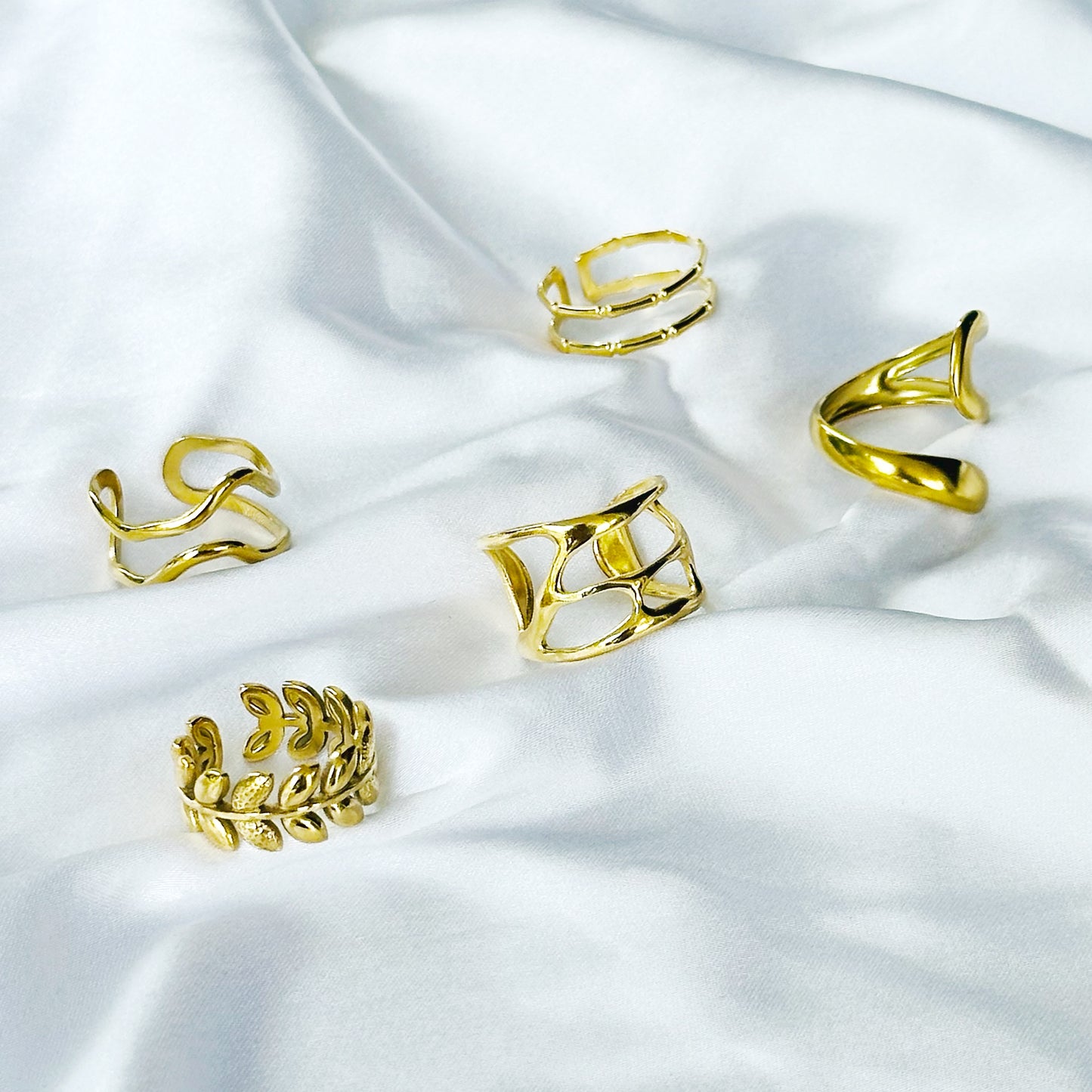 Contemporary Designs Anti-Tarnish Stainless Steel Gold Plated Adjustable Rings (Set of 5)