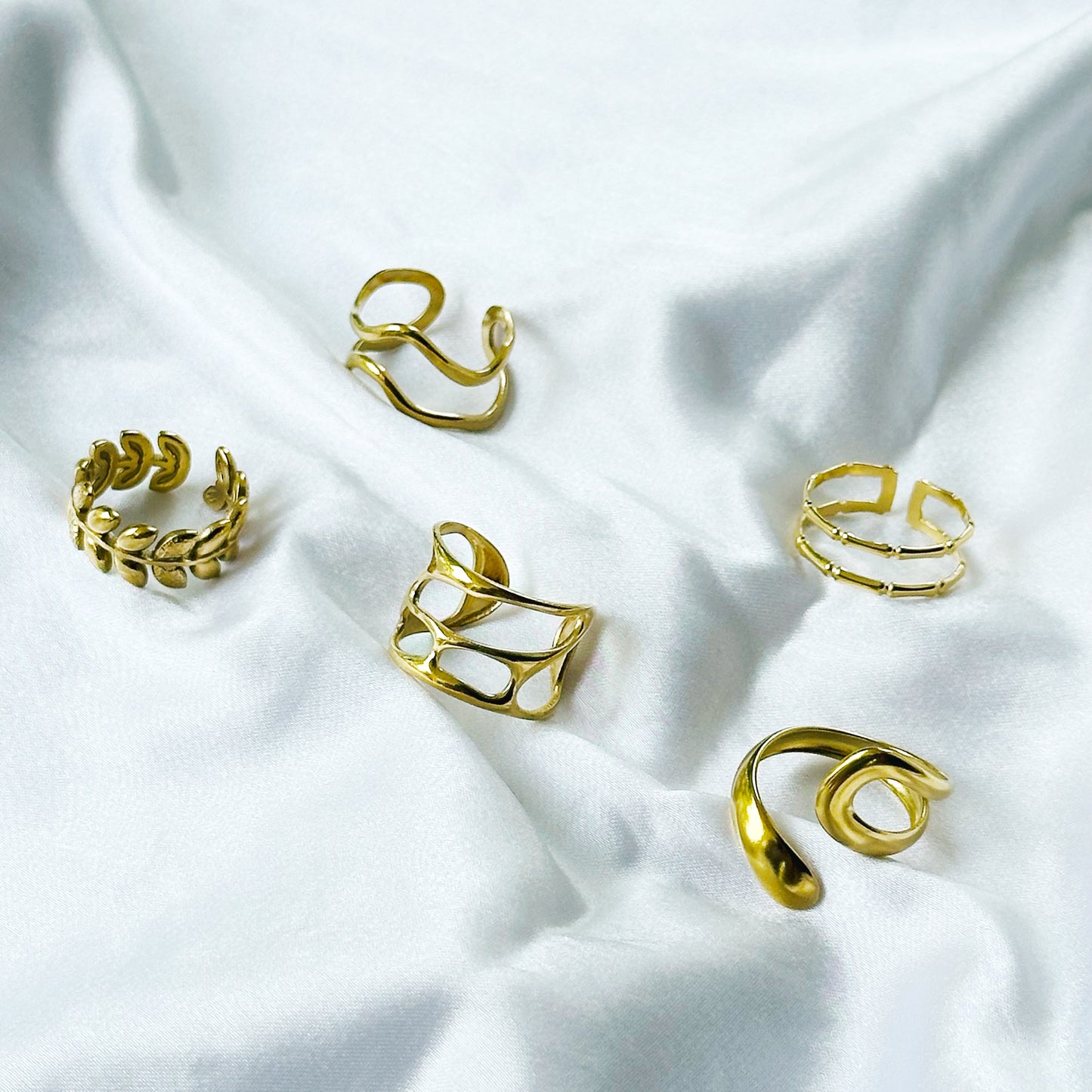 Contemporary Designs Anti-Tarnish Stainless Steel Gold Plated Adjustable Rings (Set of 5)