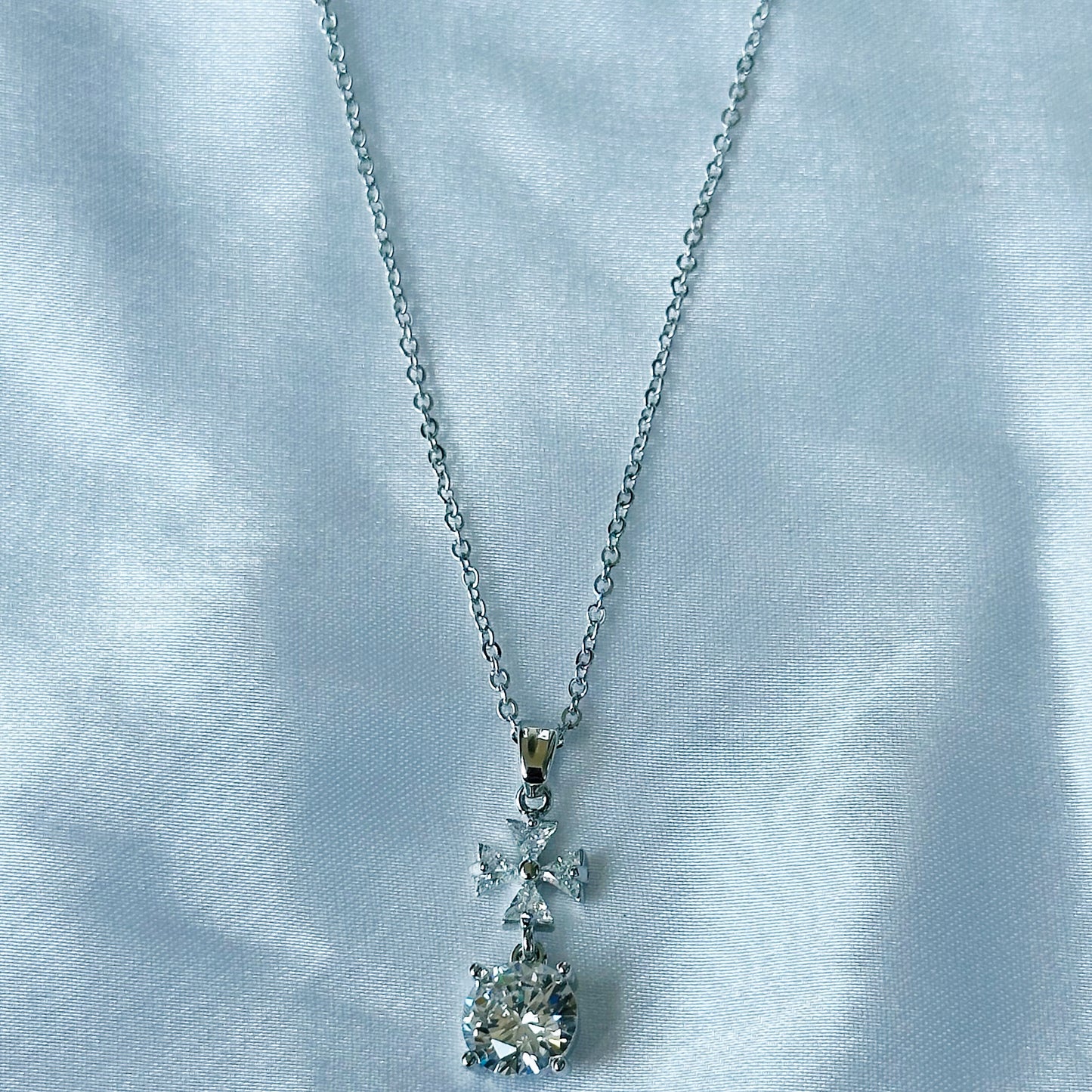 Cross Design Solitaire Cubic Zircon American Diamond Silver Plated Stainless Steel Necklace