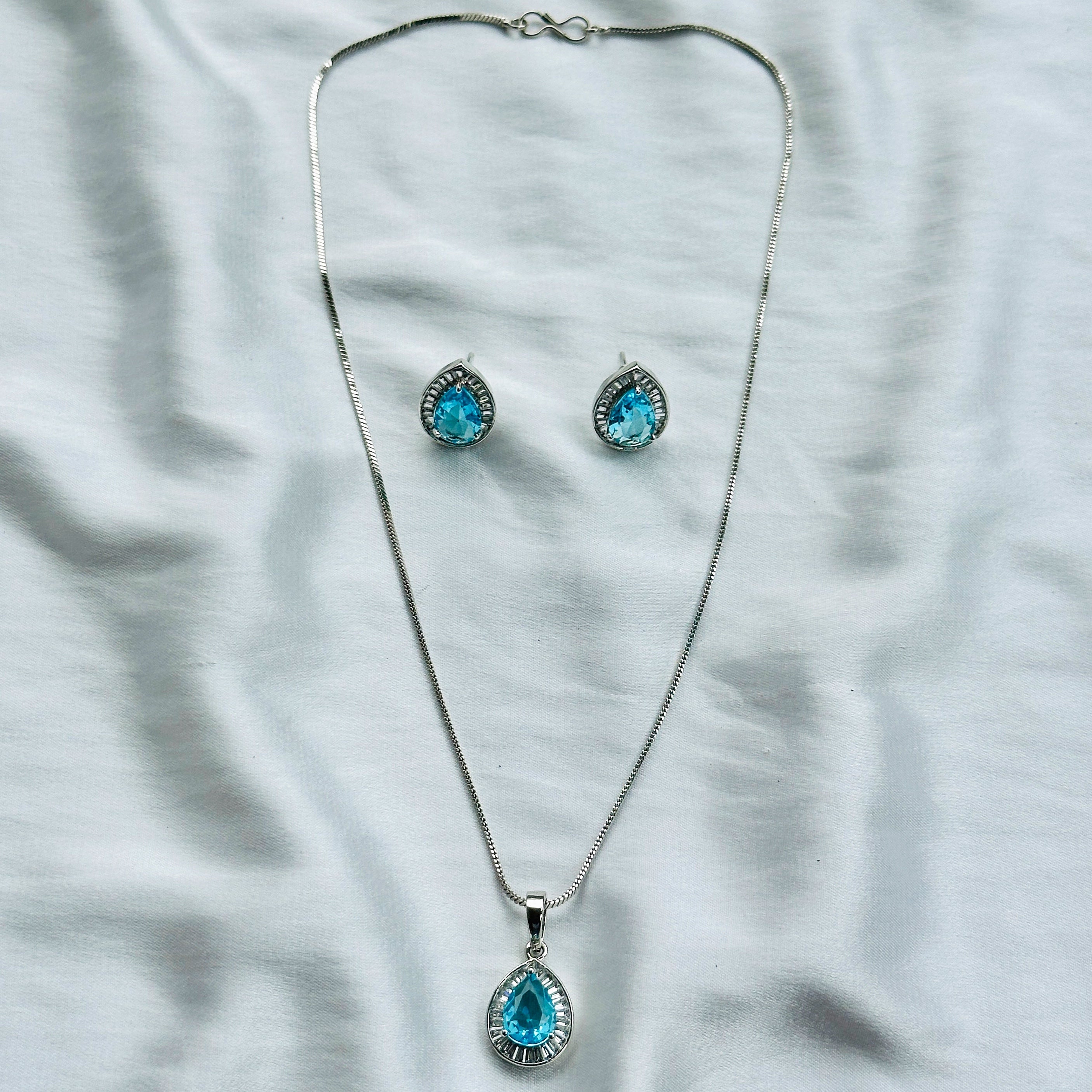 Aqua Blue Sapphire Cubic Zircon American Diamond Silver Plated Pendant Set