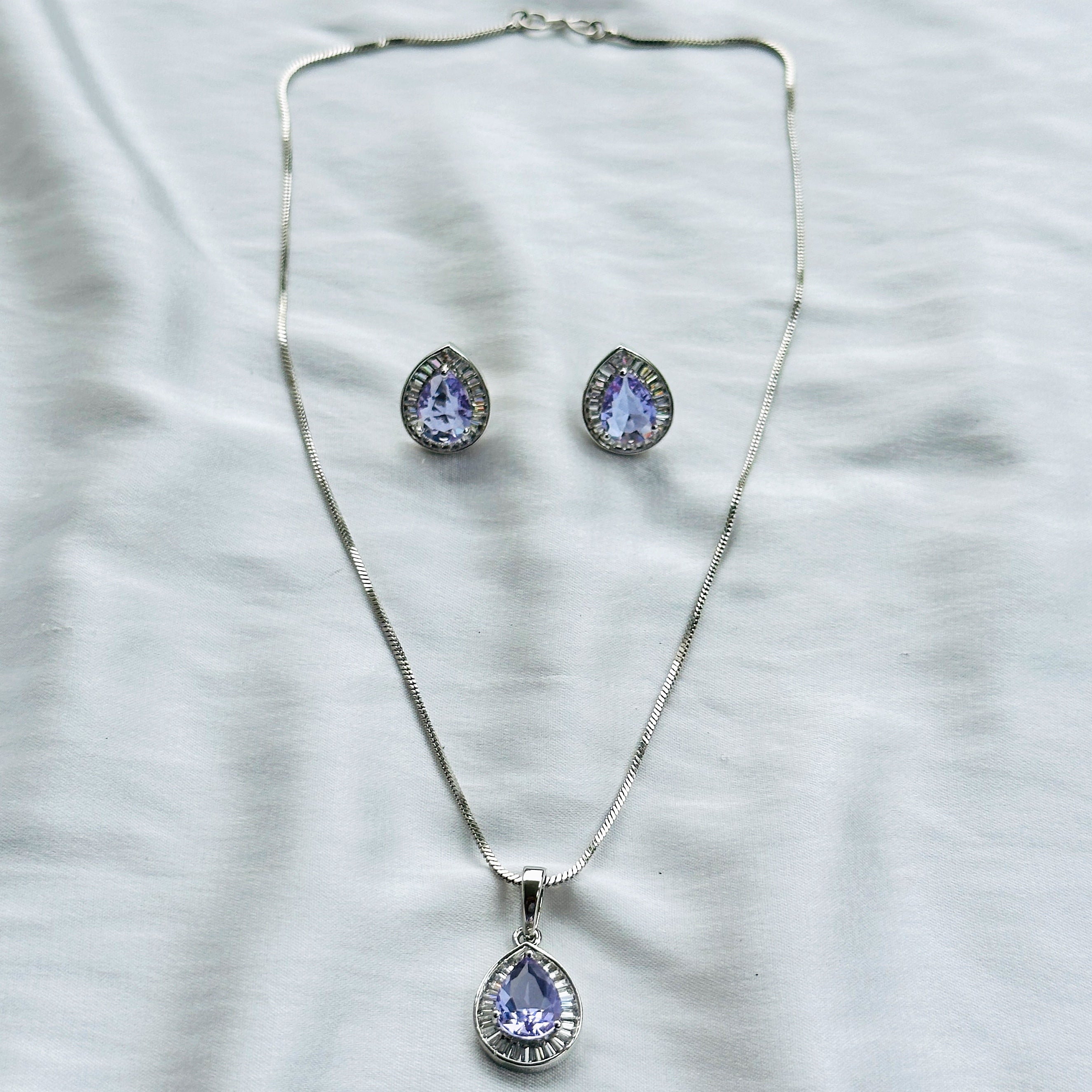 Light Amethyst Cubic Zircon American Diamond Silver Plated Pendant Set