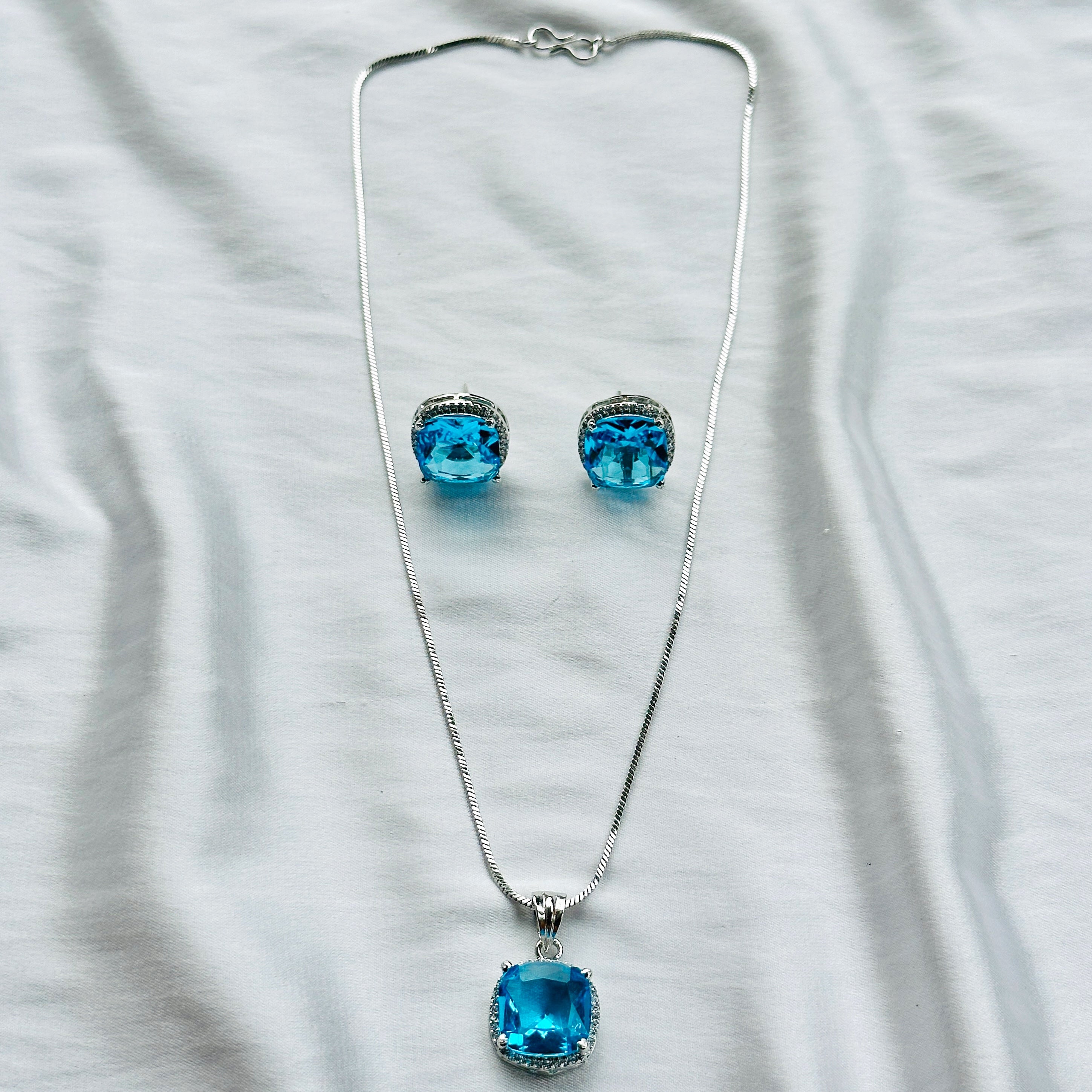 Aqua Blue Sapphire Cubic Zircon American Diamond Silver Plated Pendant Set