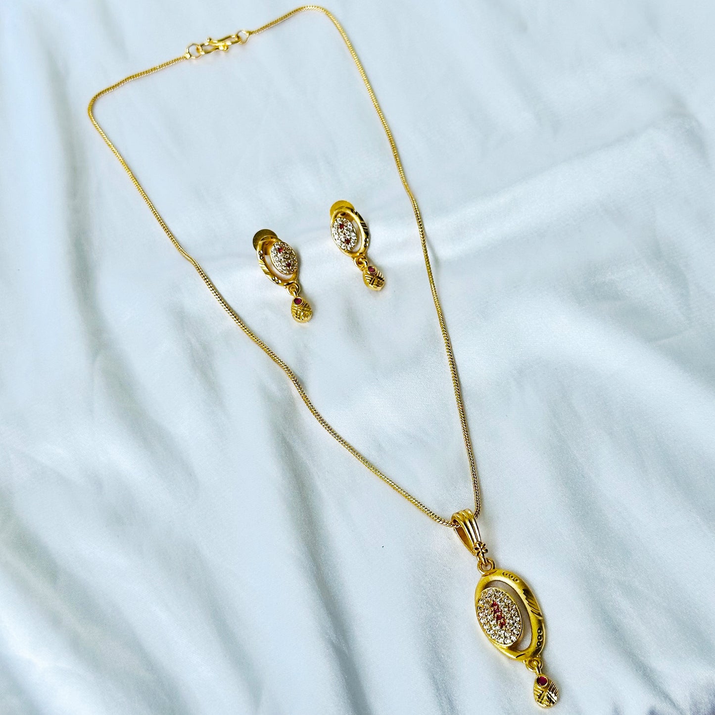 Oval Abstract Design American Diamond 1 Micron Gold Plated Pendant Set