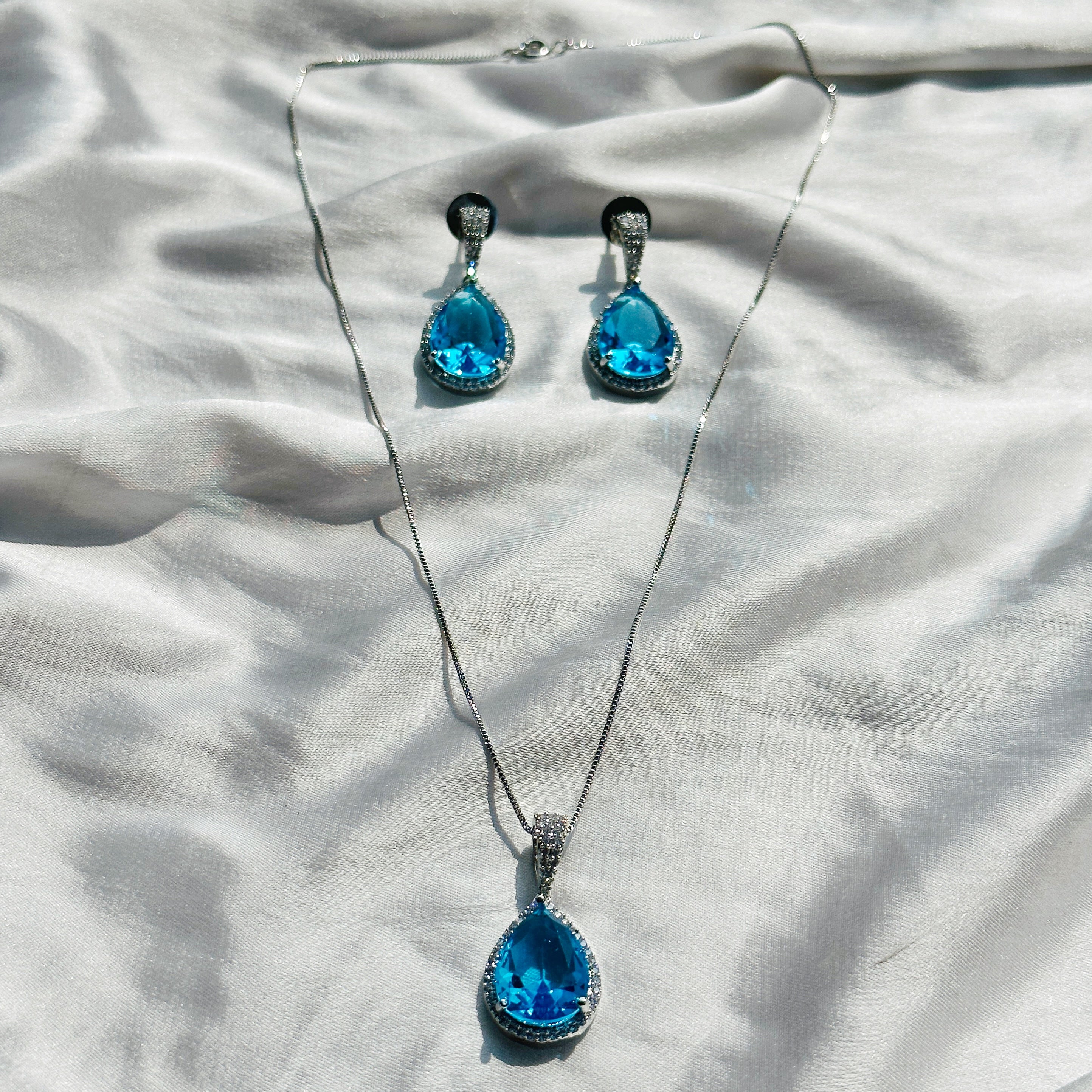 Aqua Blue Sapphire Cubic Zircon American Diamond Silver Plated Pendant Set