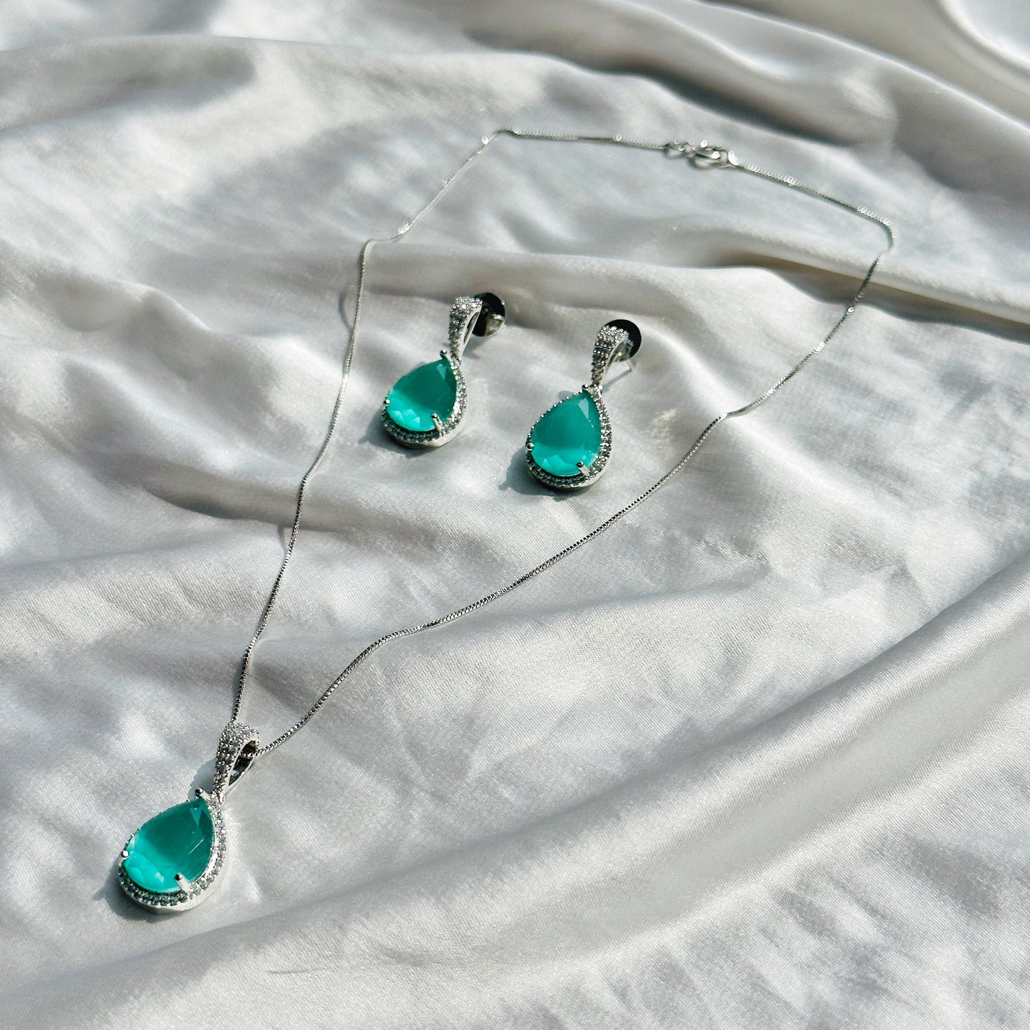 Mint Green Topaz Cubic Zircon American Diamond Silver Plated Pendant Set