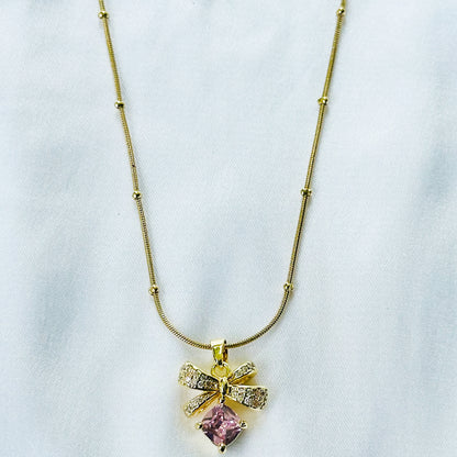 Pink Topaz Cubic Zirconia Bow Design American Diamond Gold Plated Stainless Steel Necklace