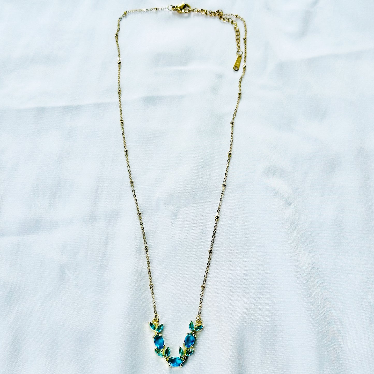 Aqua Blue Sapphire Cubic Zirconia Tulip Design American Diamond Gold Plated Stainless Steel Necklace