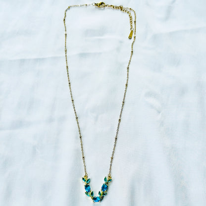 Aqua Blue Sapphire Cubic Zirconia Tulip Design American Diamond Gold Plated Stainless Steel Necklace