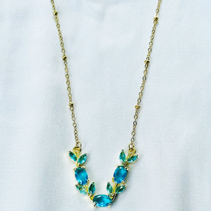 Aqua Blue Sapphire Cubic Zirconia Tulip Design American Diamond Gold Plated Stainless Steel Necklace