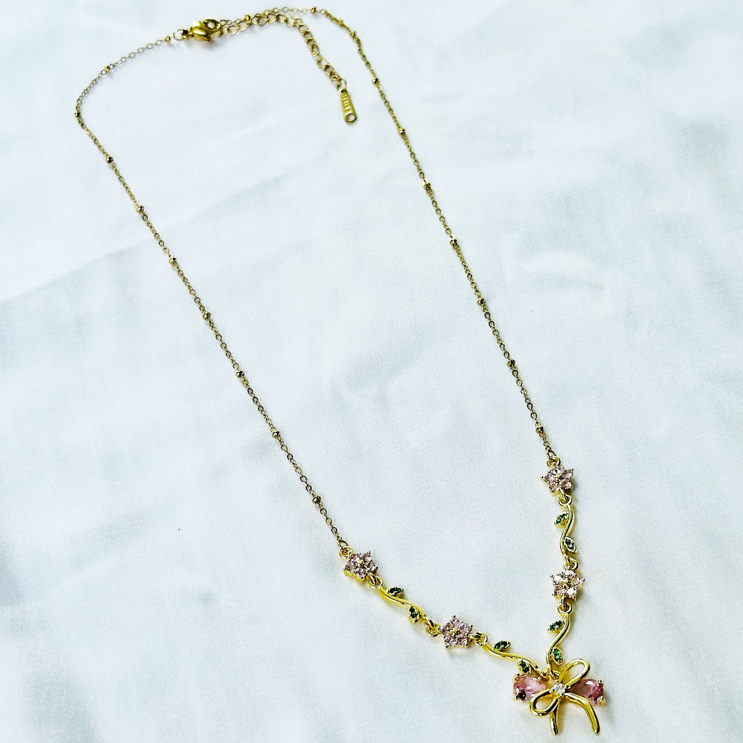 Green Emerald & Pink Topaz Cubic Zirconia Bow Design American Diamond Gold Plated Stainless Steel Necklace