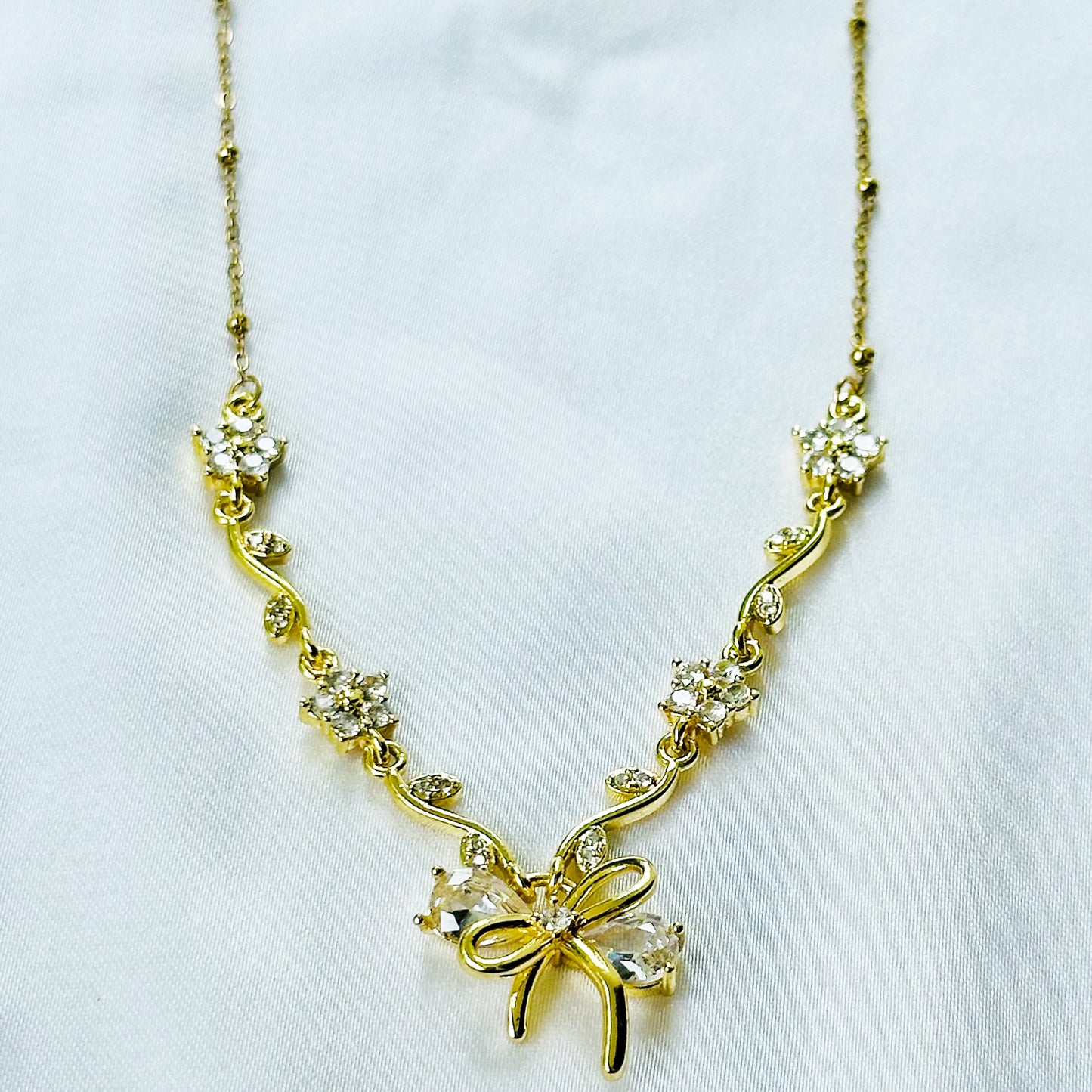 Solitaire Cubic Zirconia Bow Design American Diamond Gold Plated Stainless Steel Necklace