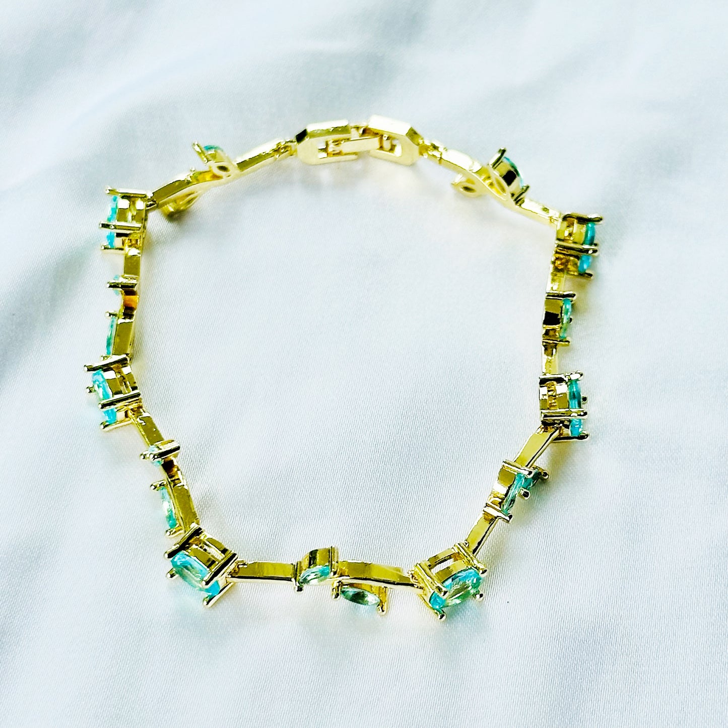 Aqua Blue Sapphire Cubic Zirconia Tulip Design American Diamond Gold Plated Stainless Steel Bracelet
