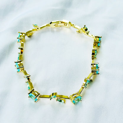 Aqua Blue Sapphire Cubic Zirconia Tulip Design American Diamond Gold Plated Stainless Steel Bracelet