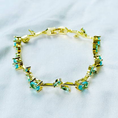 Aqua Blue Sapphire Cubic Zirconia Tulip Design American Diamond Gold Plated Stainless Steel Bracelet