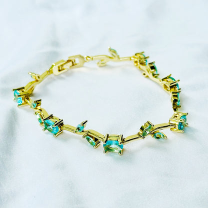 Aqua Blue Sapphire Cubic Zirconia Tulip Design American Diamond Gold Plated Stainless Steel Bracelet