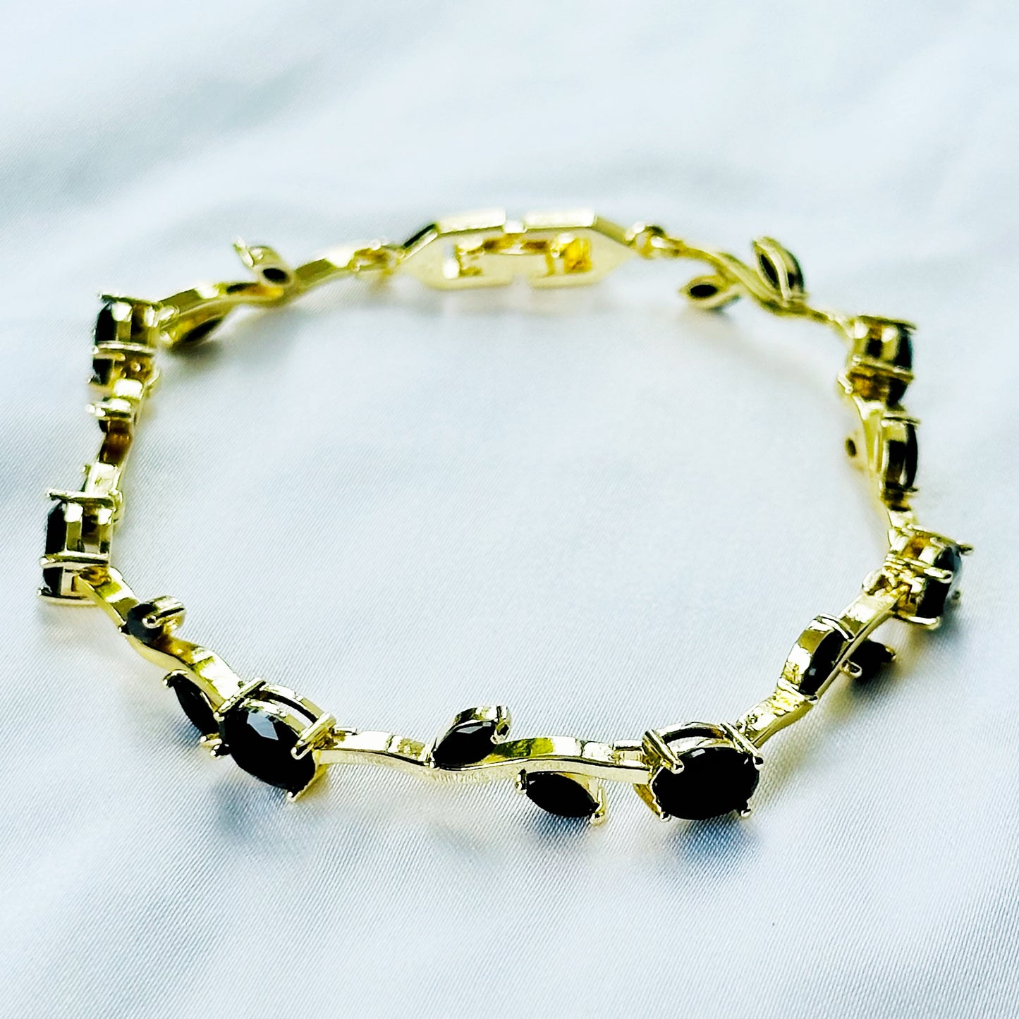 Black Zirconia Tulip Design American Diamond Gold Plated Stainless Steel Bracelet