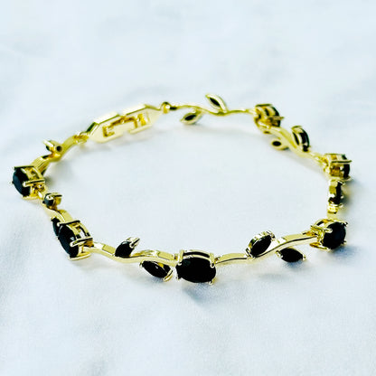 Black Zirconia Tulip Design American Diamond Gold Plated Stainless Steel Bracelet