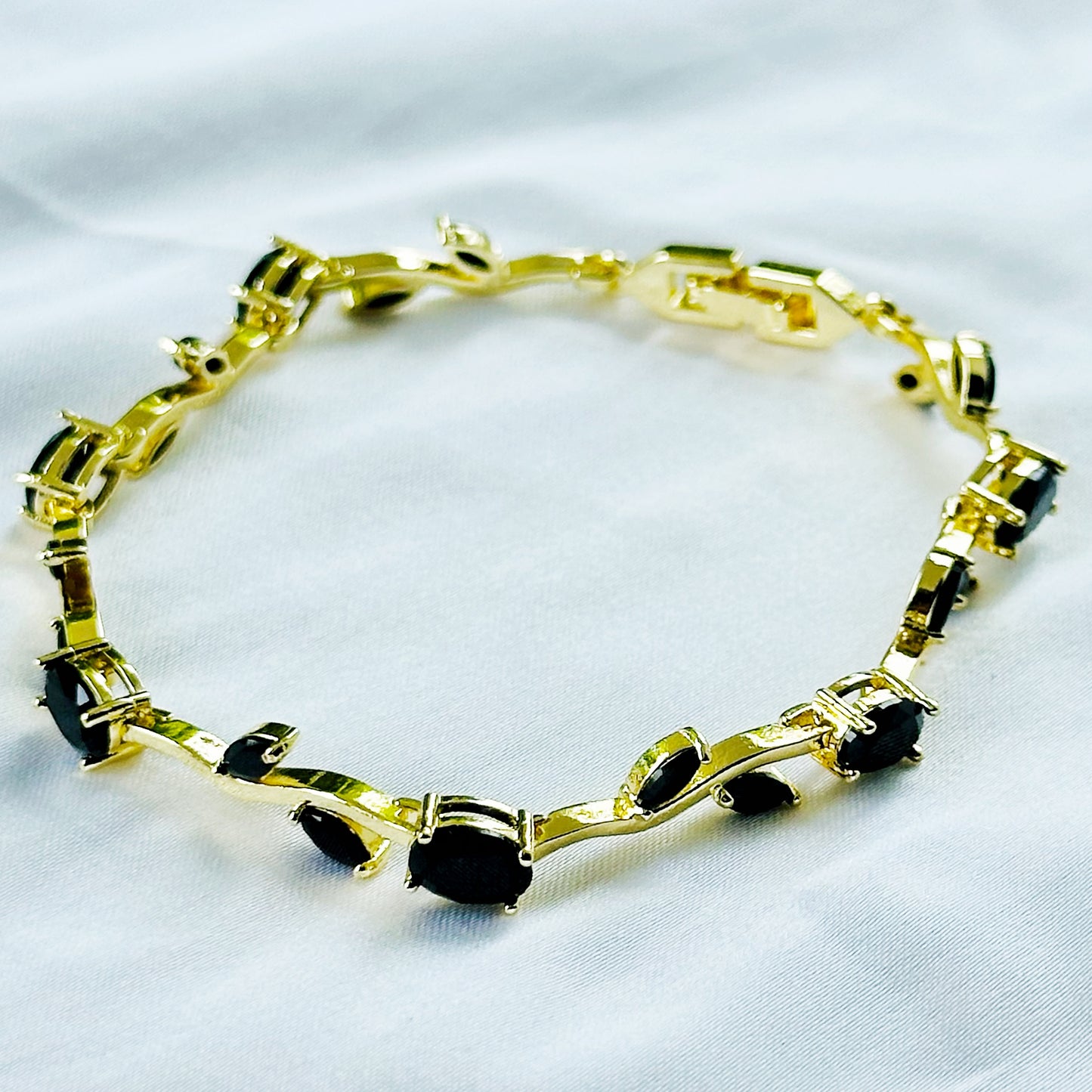Black Zirconia Tulip Design American Diamond Gold Plated Stainless Steel Bracelet